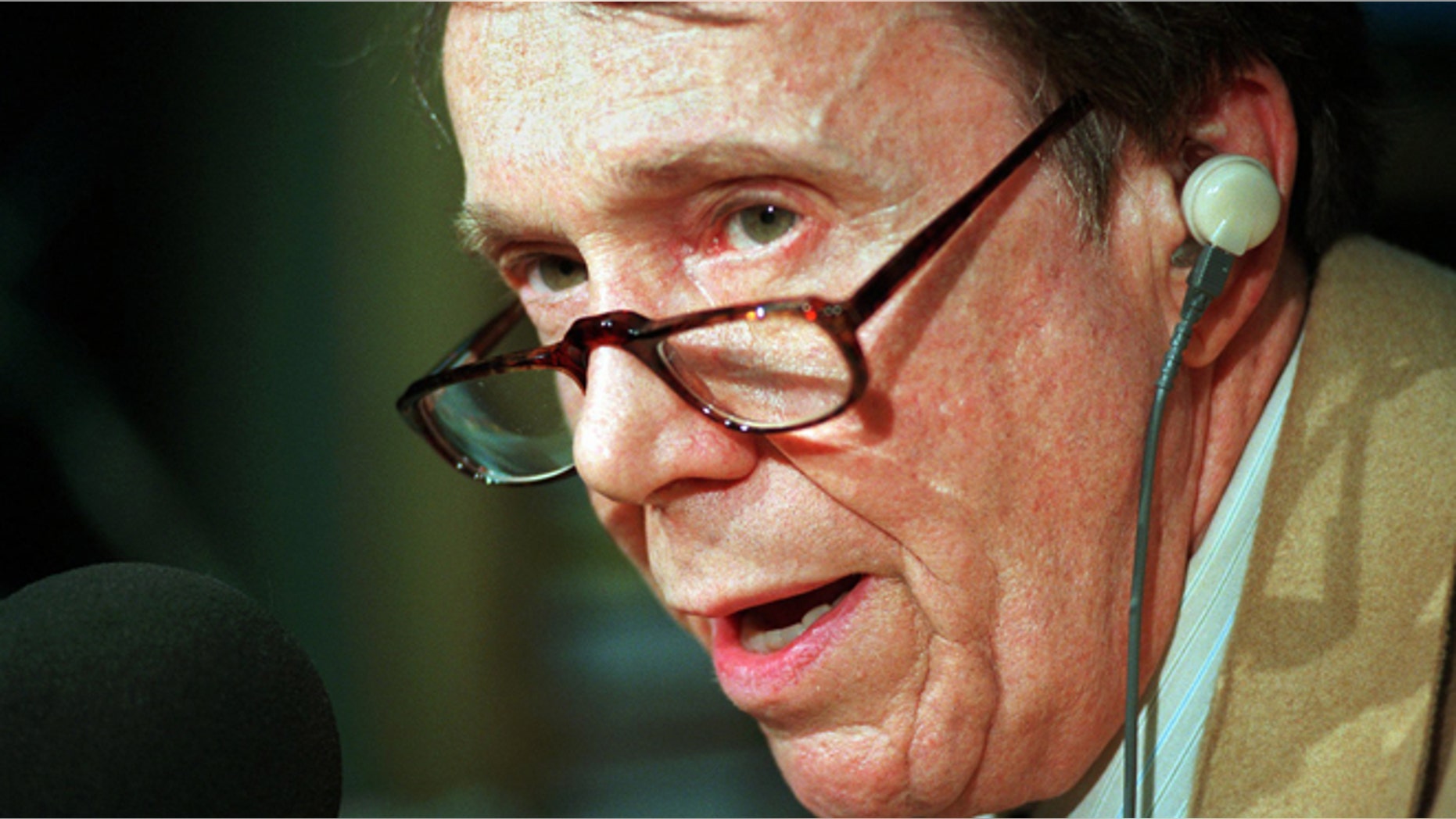 April 29, 1996: Longtime conservative radio host Bob Grant speaks on the air at WOR-AM in New York. Grant died Tuesday, Dec. 31, 2013, at the age of 84, in Hilllsborough, N.J., after a short illness according to New York radio station WABC. (AP/Kathy Willens, File)