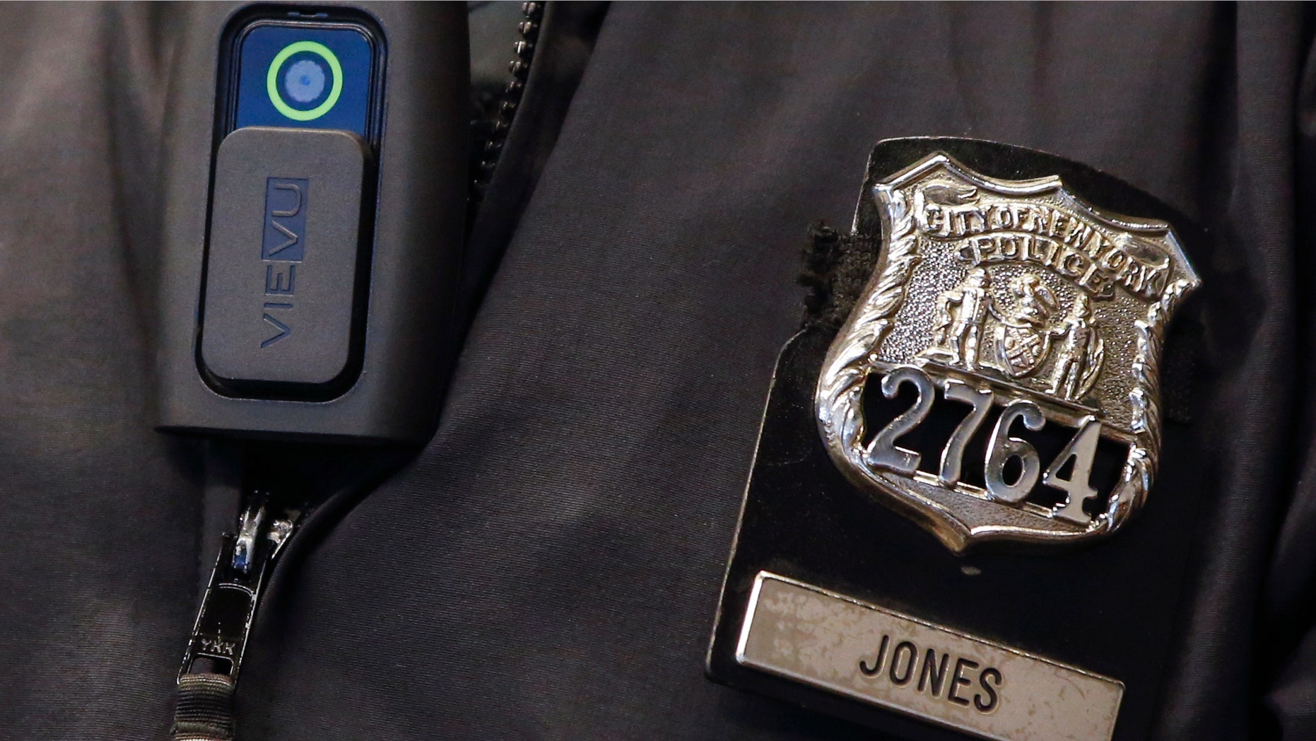 Dec. 3, 2014: A police body camera is seen on an officer during a news conference.