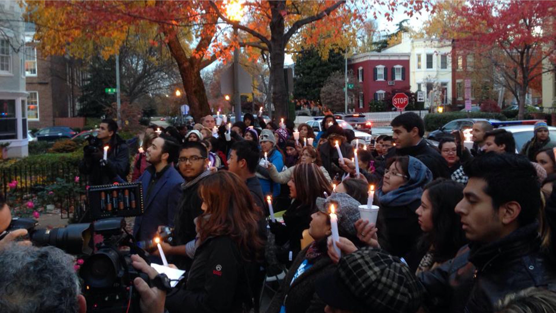 Immigrants hold a protest vigil for immigration reform outside the home of House Speaker John Boehner.