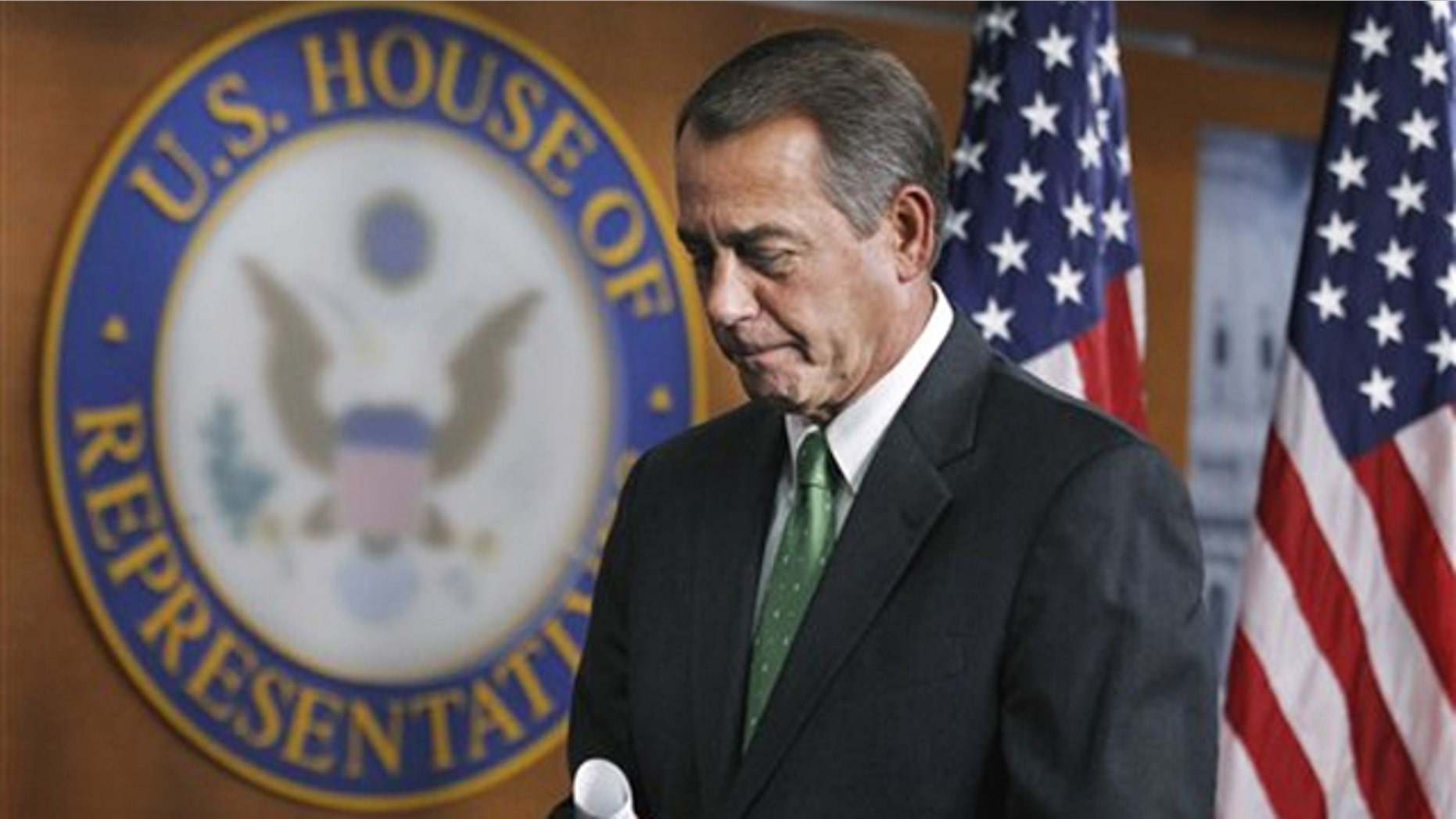 House Speaker John Boehner leaves a news conference on Capitol Hill in Washington Feb. 10.