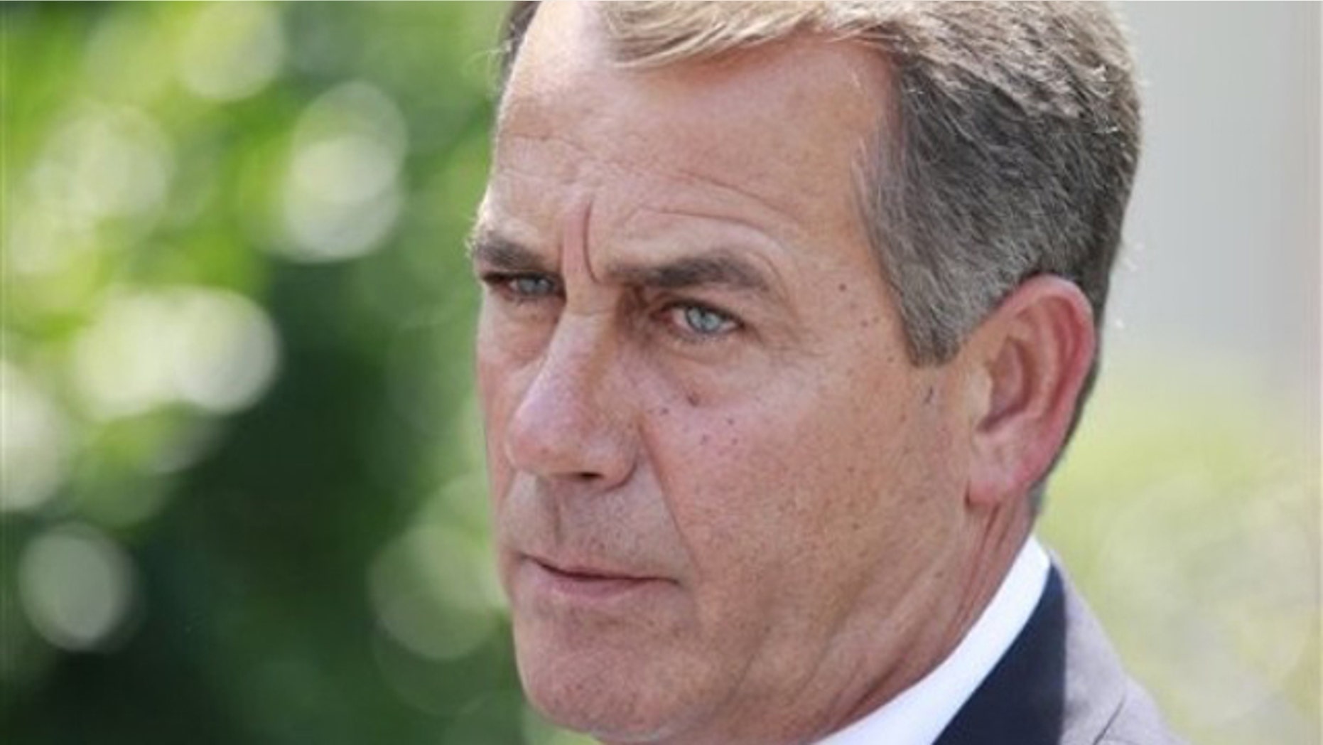 In this June 10 photo, House Minority Leader John Boehner of Ohio speaks to reporters outside the White House. (AP Photo)