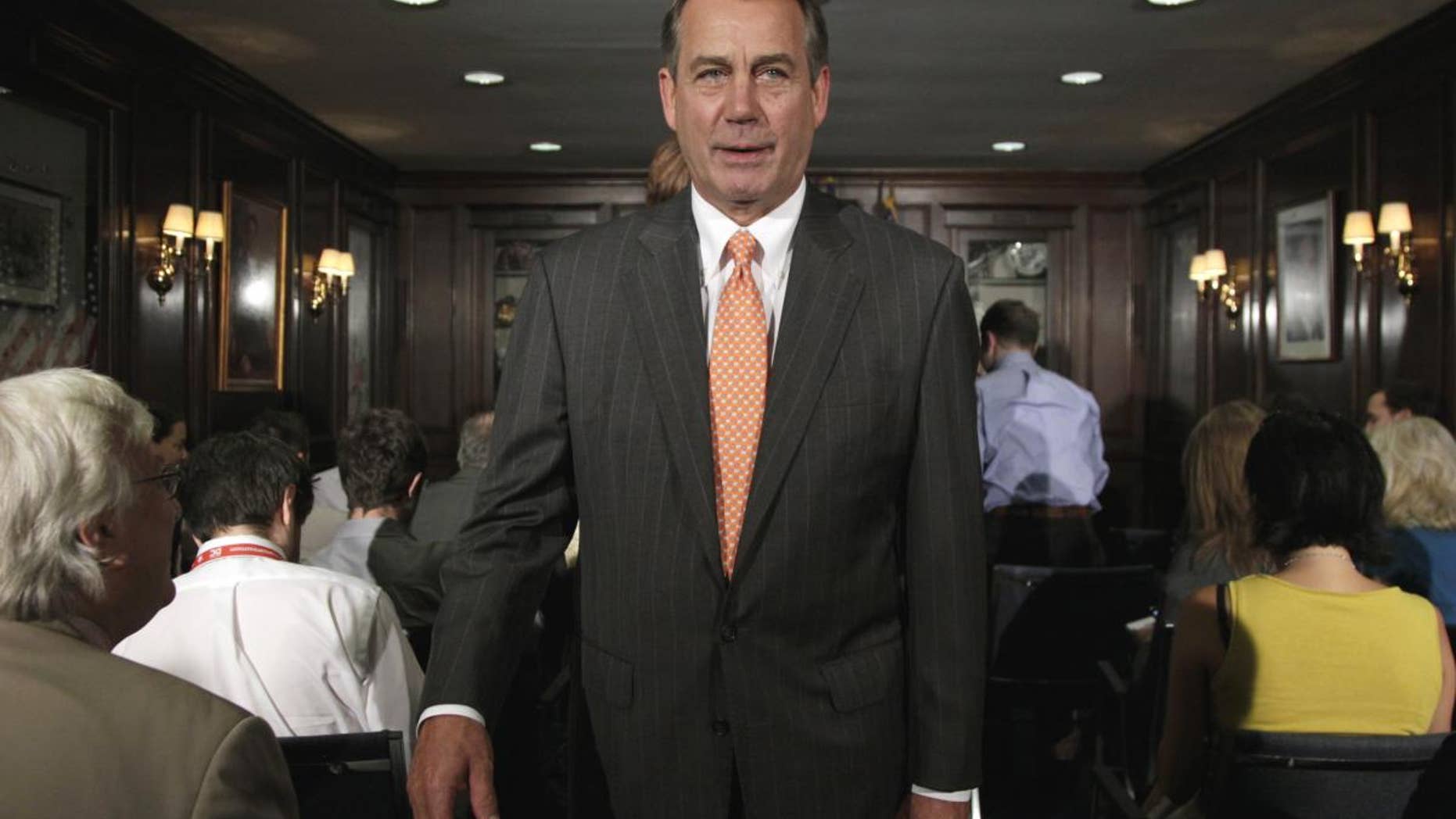 House Speaker John Boehner of Ohio leaves after making a statement at The Republican National Committee on Capitol Hill in Washington, Tuesday, July 26, 2011. (AP Photo/Carolyn Kaster)