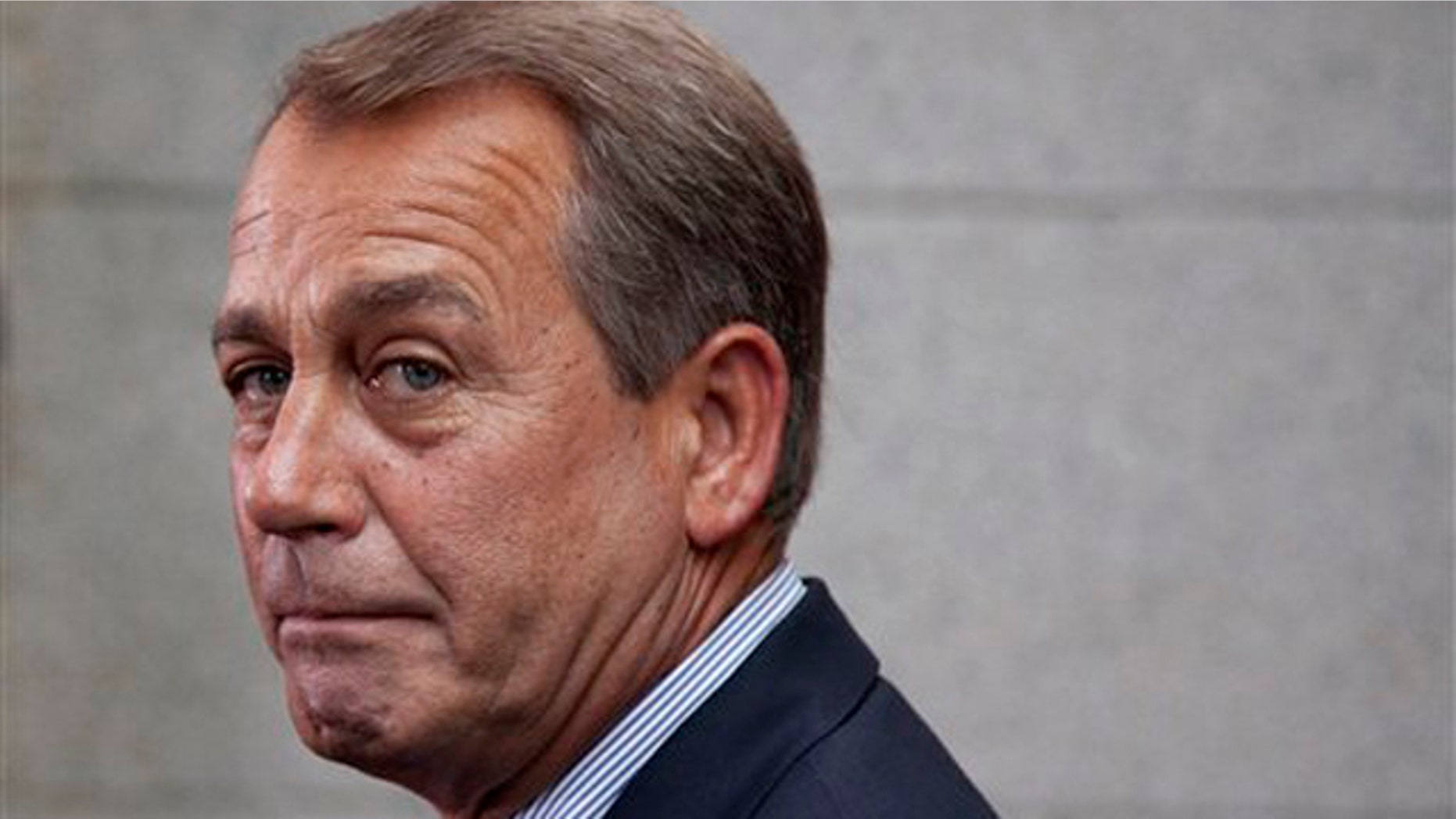 House Speaker John Boehner makes a statement after a Republican caucus meeting on Capitol Hill Sept. 8.