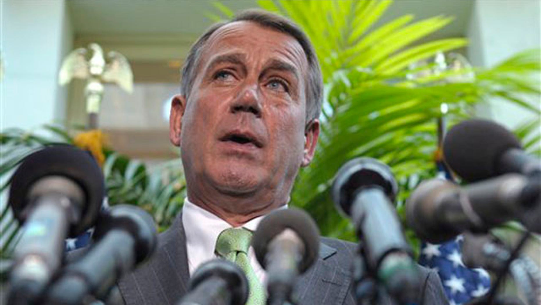 House Speaker John Boehner speaks at a news conference on Capitol Hill in Washington July 12.