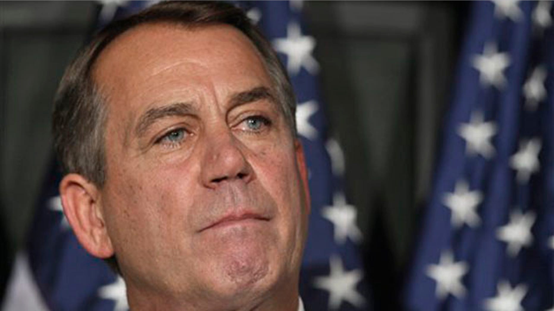 House Speaker John Boehner pauses during a news conference at The Republican National Committee on Capitol Hill in Washington July 26.
