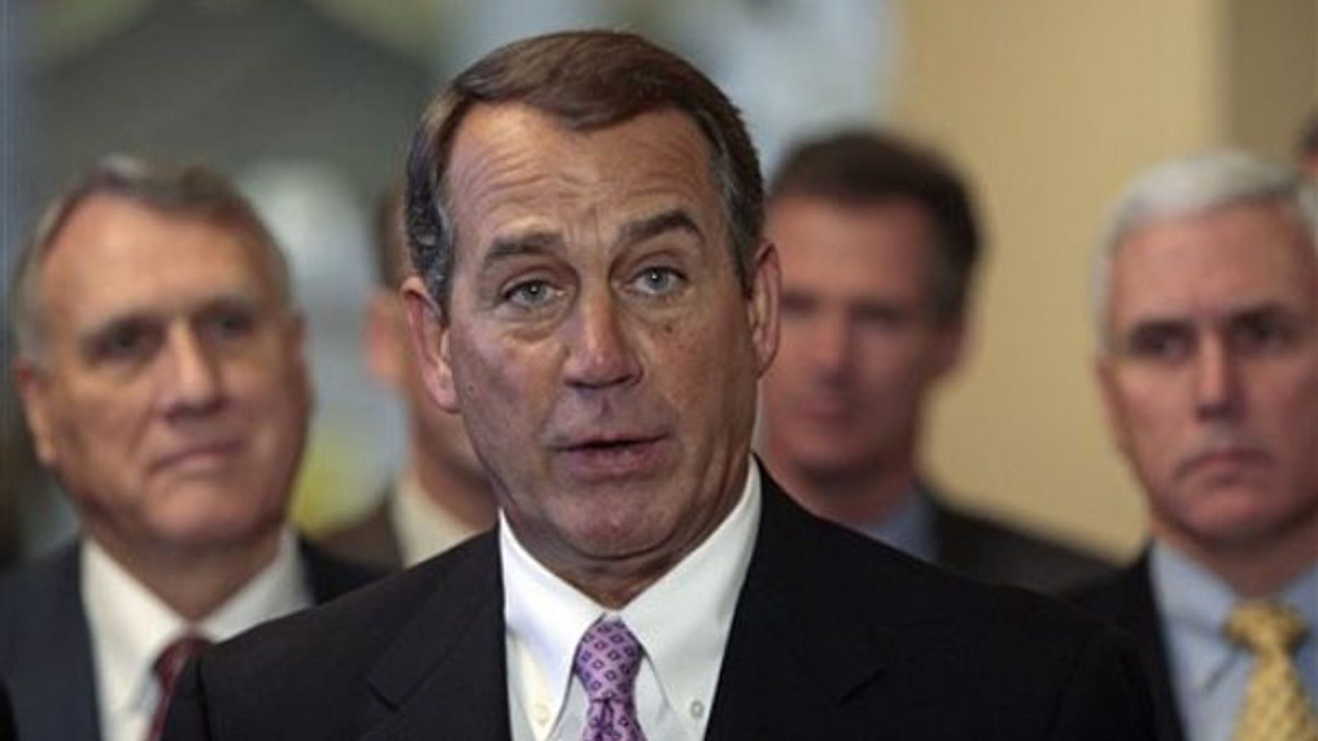 House Minority Leader John Boehner speaks to reporters, alongside other House and Senate lawmakers, on Capitol Hill March 18. (AP Photo)