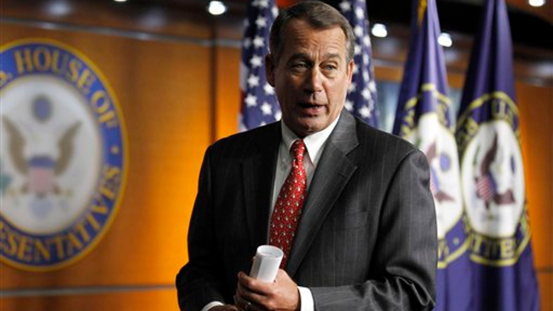 In this Dec. 17 photo, House Speaker-designate John Boehner talks with media on Capitol Hill in Washington.