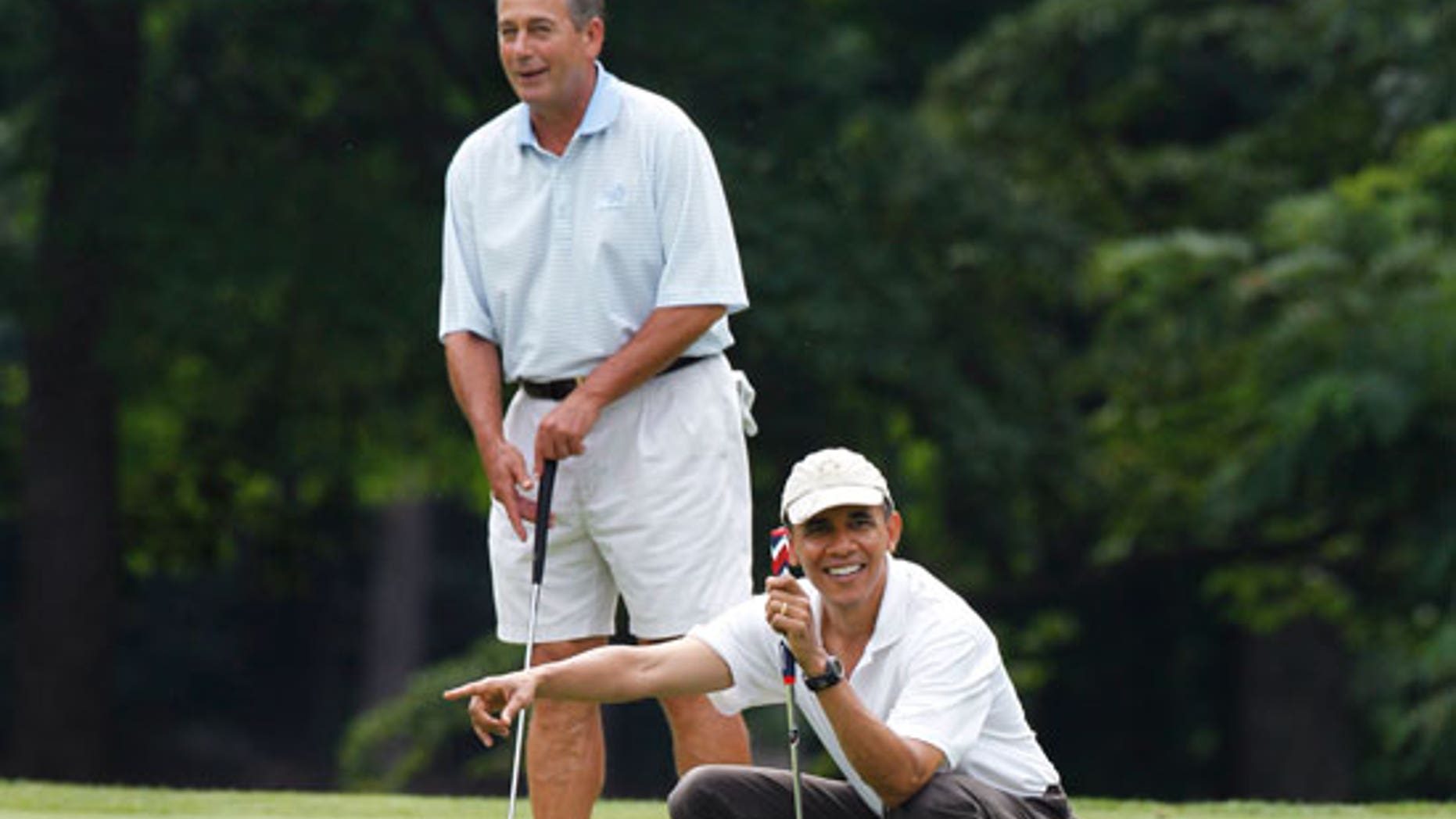 June 18, 2011: President Obama and House Speaker John Boehner, R-Ohio, on the first green as they play golf at Andrews Air Force Base, Md.