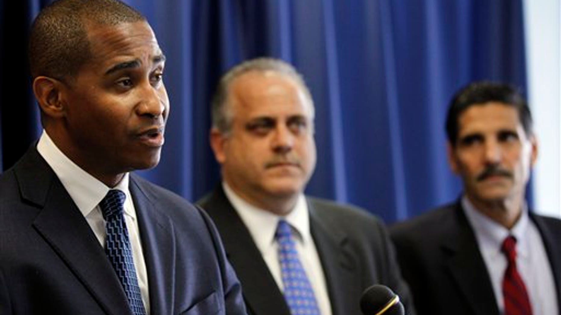 Sept. 29: U.S. Attorney Zane Memeger, left, with FBI Special Agent in Charge, George Venizelos, and DEA acting Special Agent in Charge Vito Guarino speak during a media availability at the Department of Justice. More than three dozen people have been charged in a prescription drug sweep that included a raid on a Boeing plant near Philadelphia that makes military helicopters.