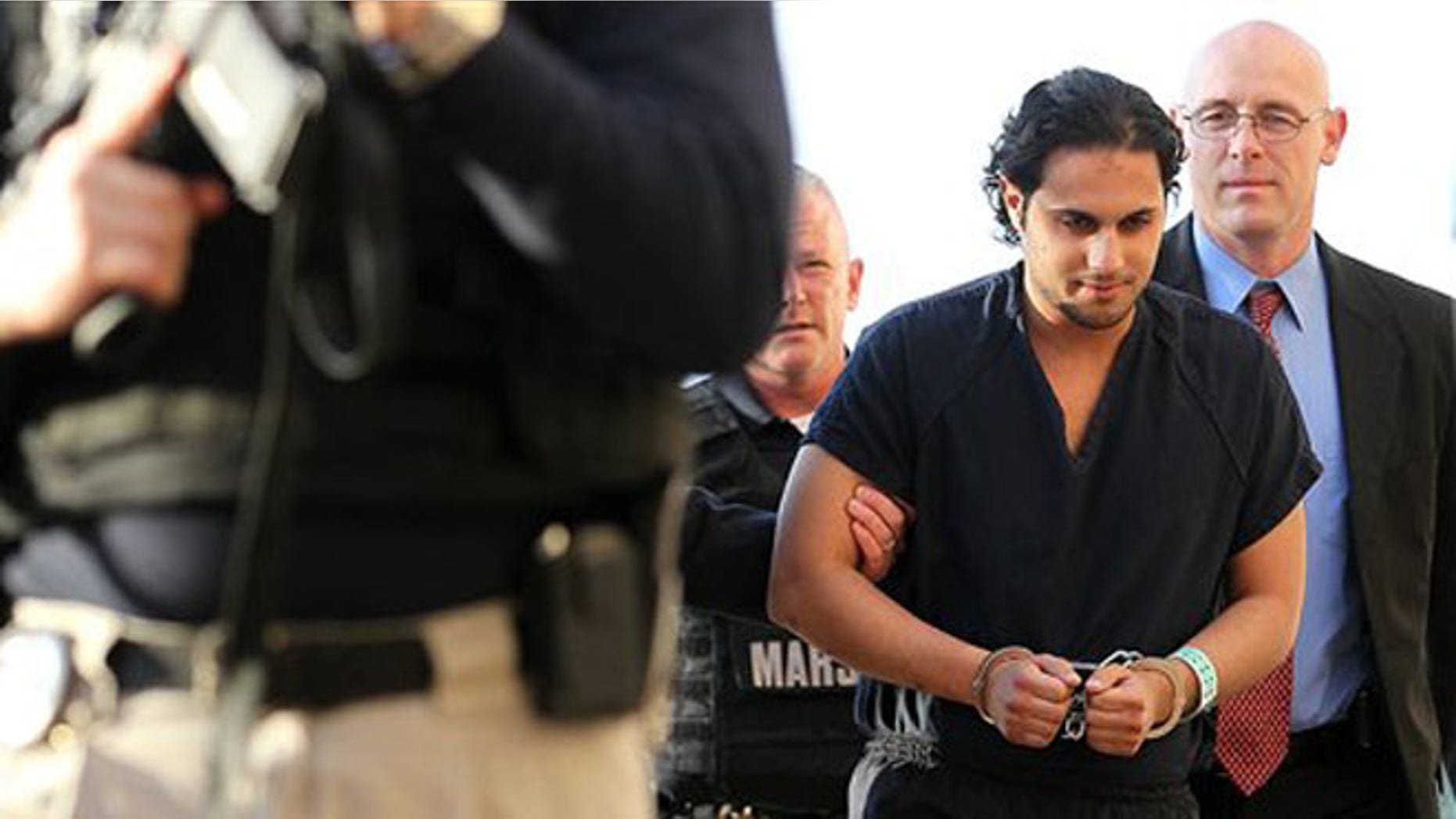 Feb. 25, 2011: In this file photo, Khalid Ali-M Aldawsari is escorted to court in Lubbock, Texas.