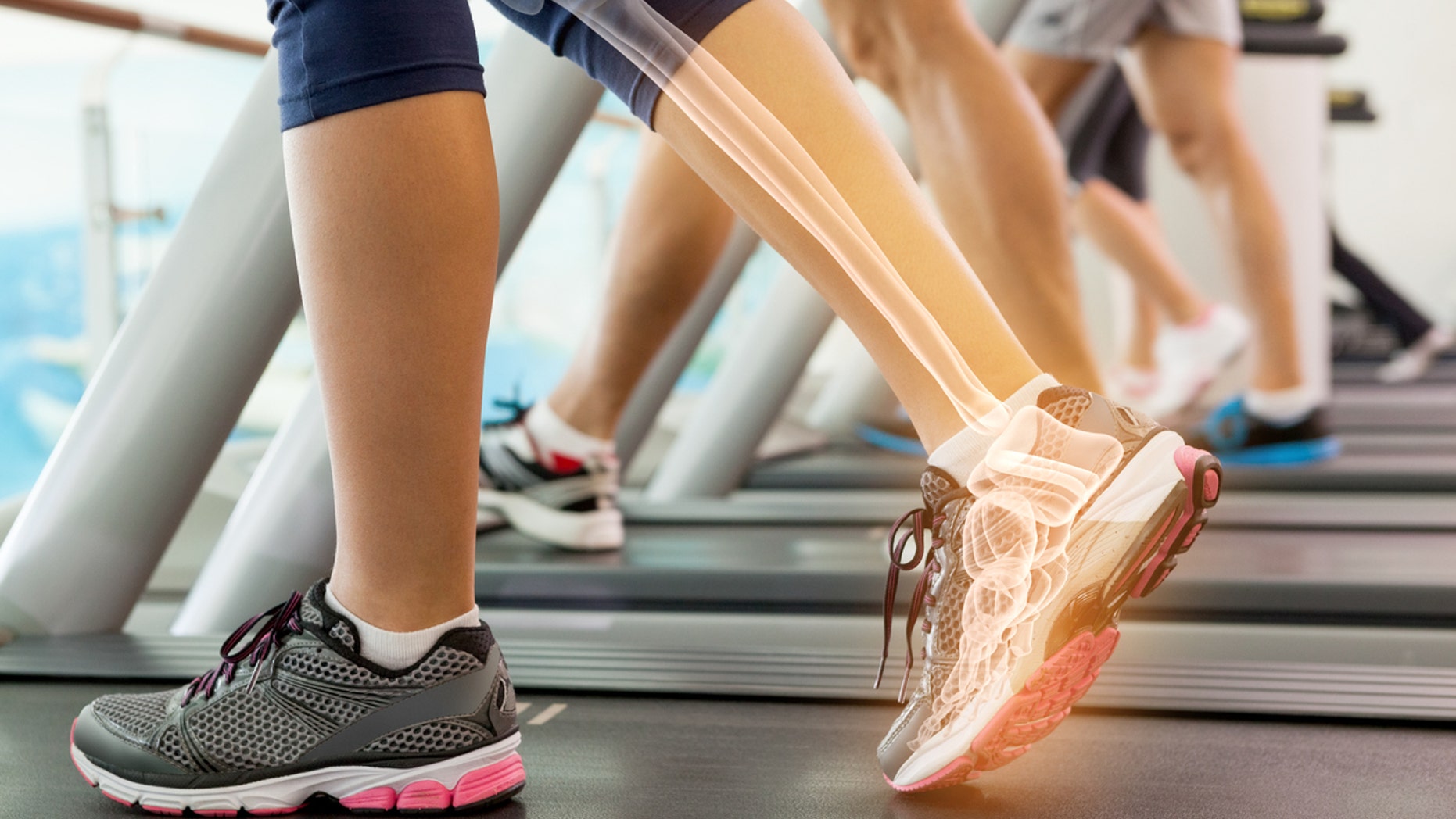 Digital composite of Highlighted ankle of woman on treadmill