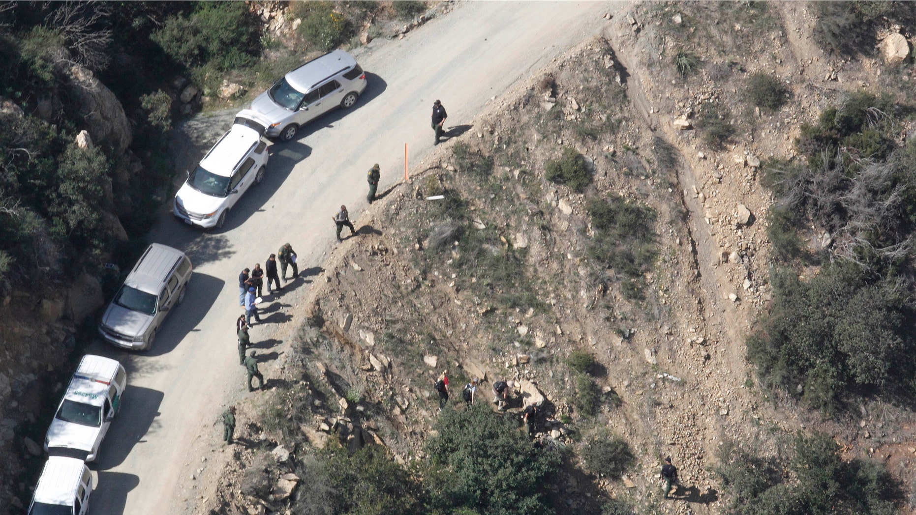This aerial photo shows the scene of a shooting by a U.S. Border Patrol agent near San Diego on Tuesday, Feb. 18, 2014.