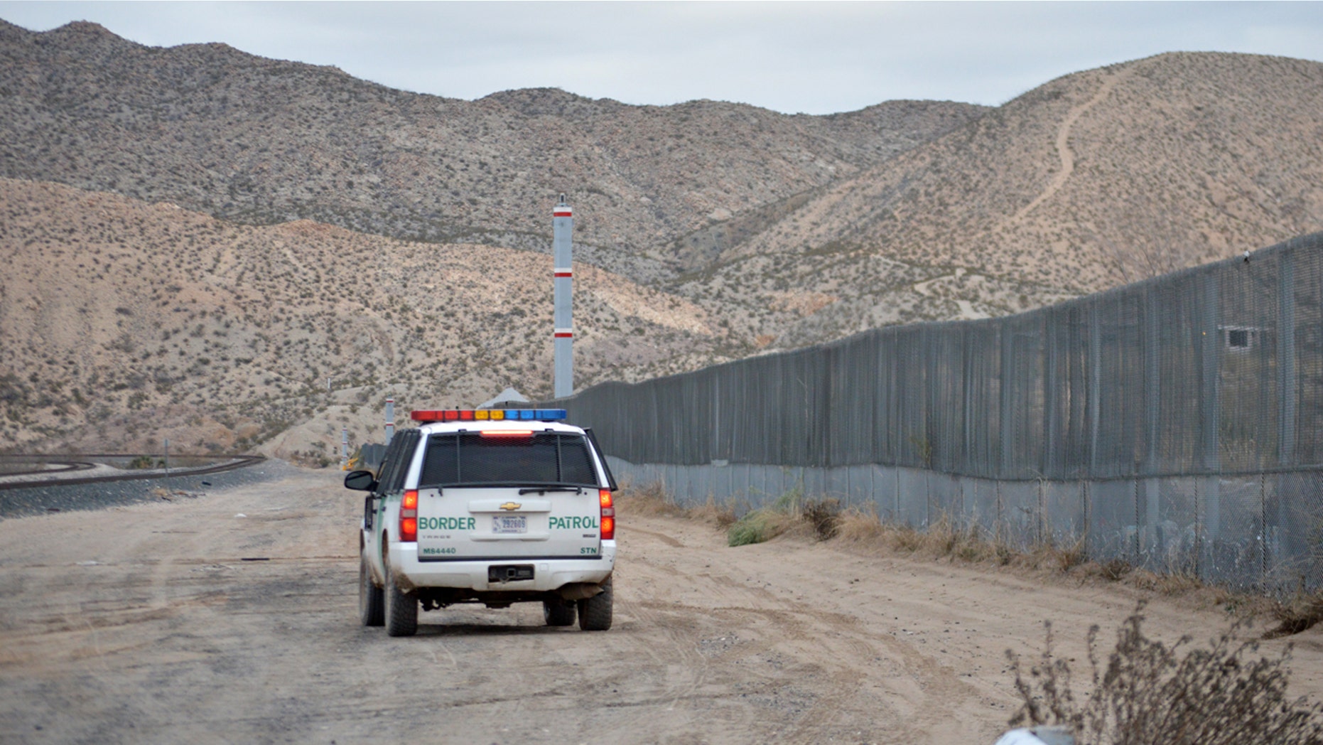 Jan. 4, 2016: , A U.S. Border Patrol agent drives near the U.S.-Mexico border fence in Sunland Park, N.M.