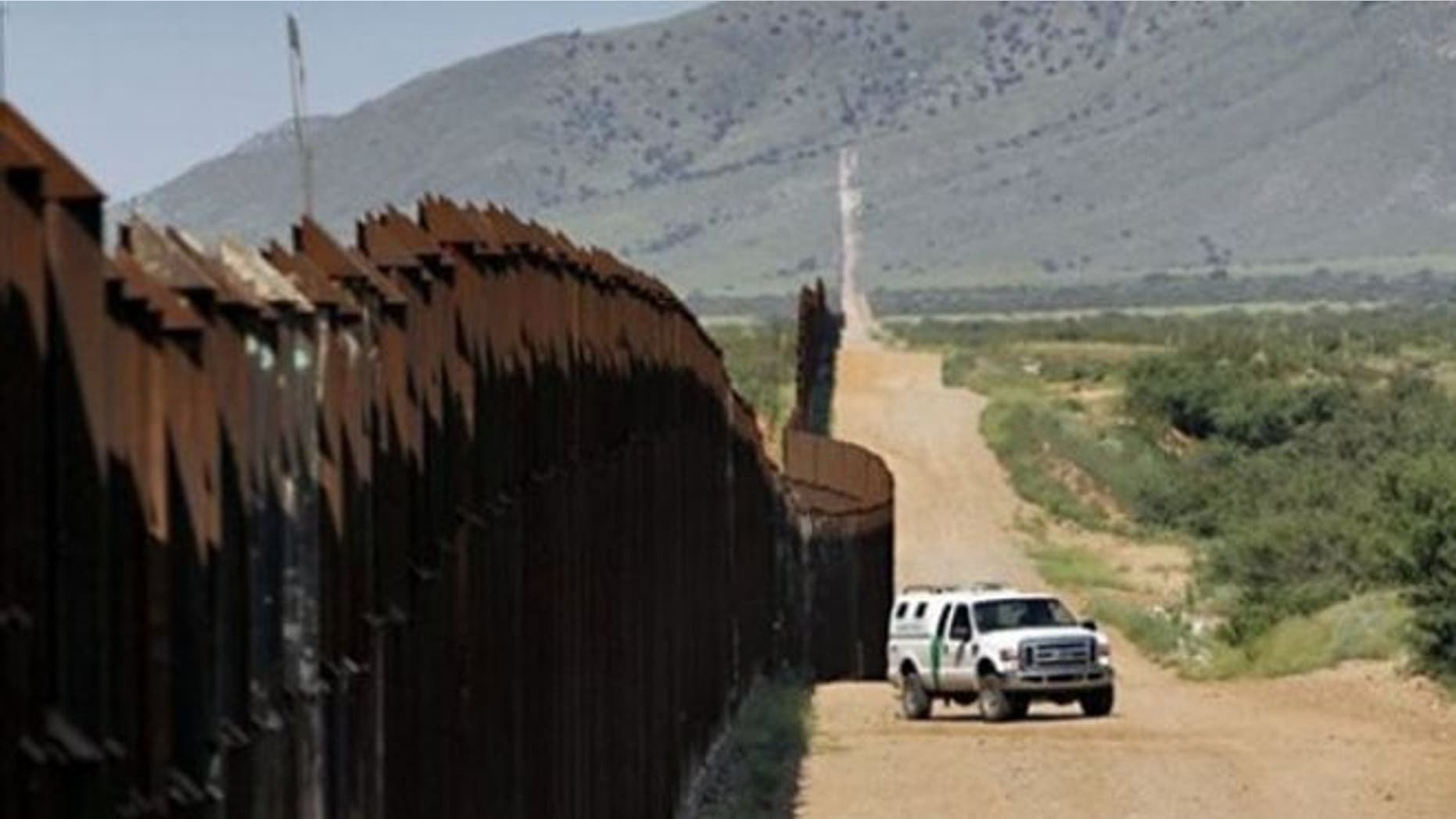 Aug. 15, 2010: A U.S. Customs and Border Patrol agent patrols along the Arizona-Mexico border in Hereford, Ariz.