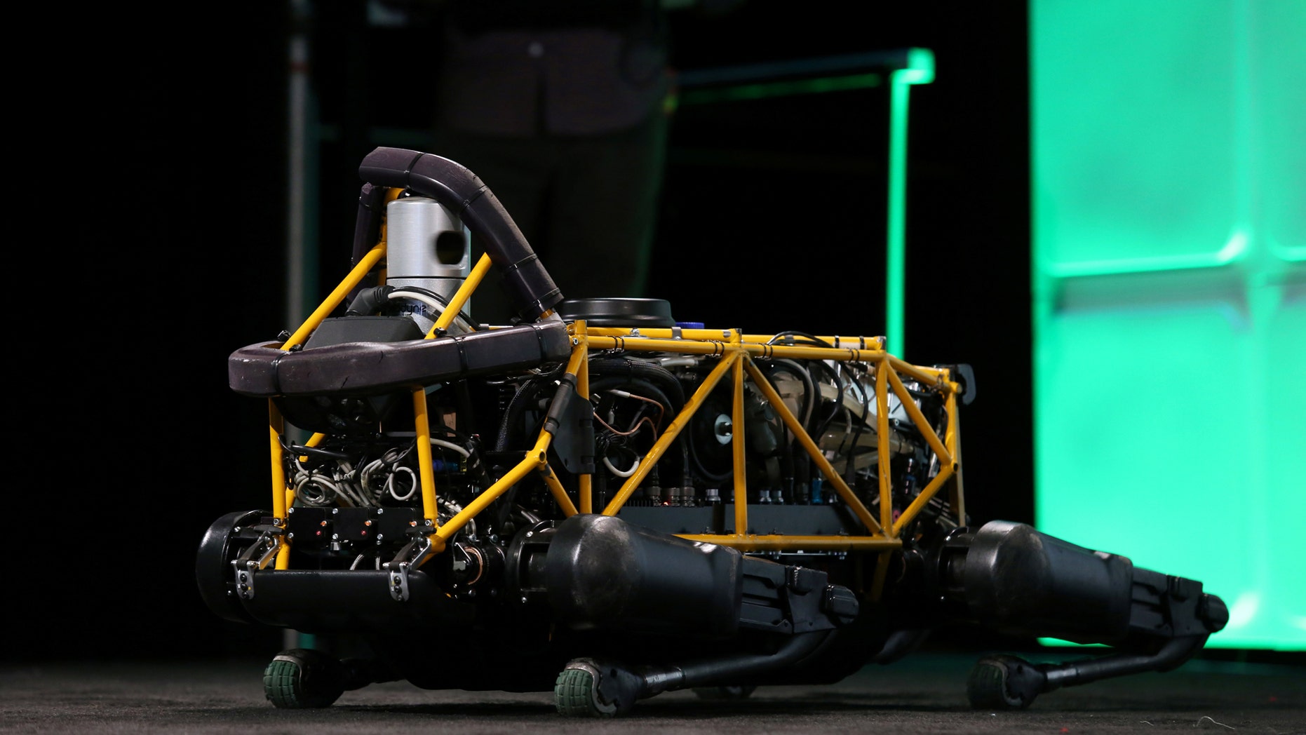 File photo: oston Dynamics' Spot robot lies down on the stage during 2016 TechCrunch Disrupt in San Francisco, California, U.S. September 14, 2016. (REUTERS/Beck Diefenbach)