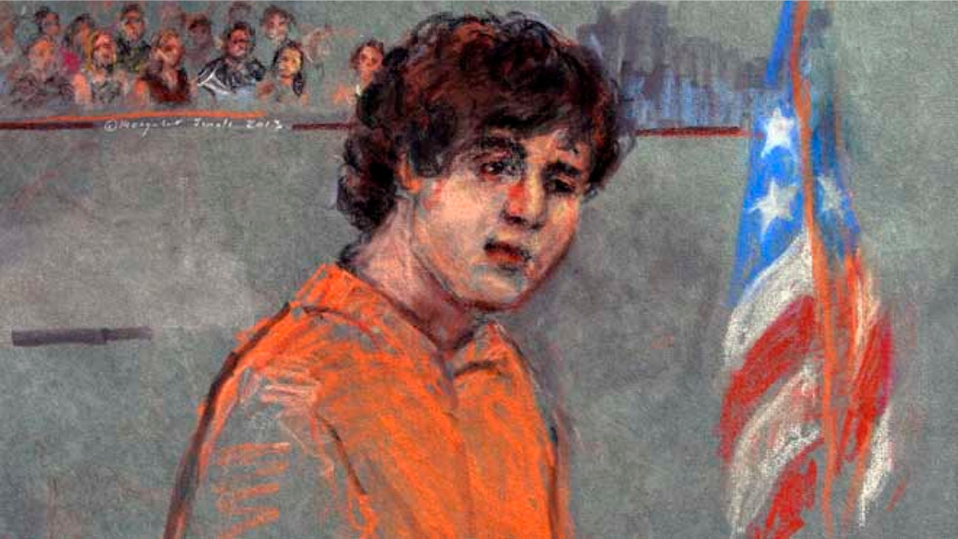 July 10, 2013: This courtroom sketch depicts Boston Marathon bombing suspect Dzhokhar Tsarnaev during arraignment in federal court in Boston.