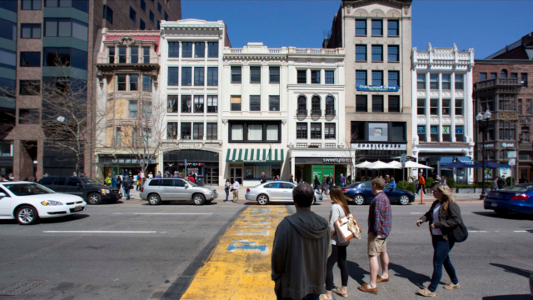 April 27, 2013: People pause on Boylston Street at the finish line of the Boston Marathon in Boston, Mass.