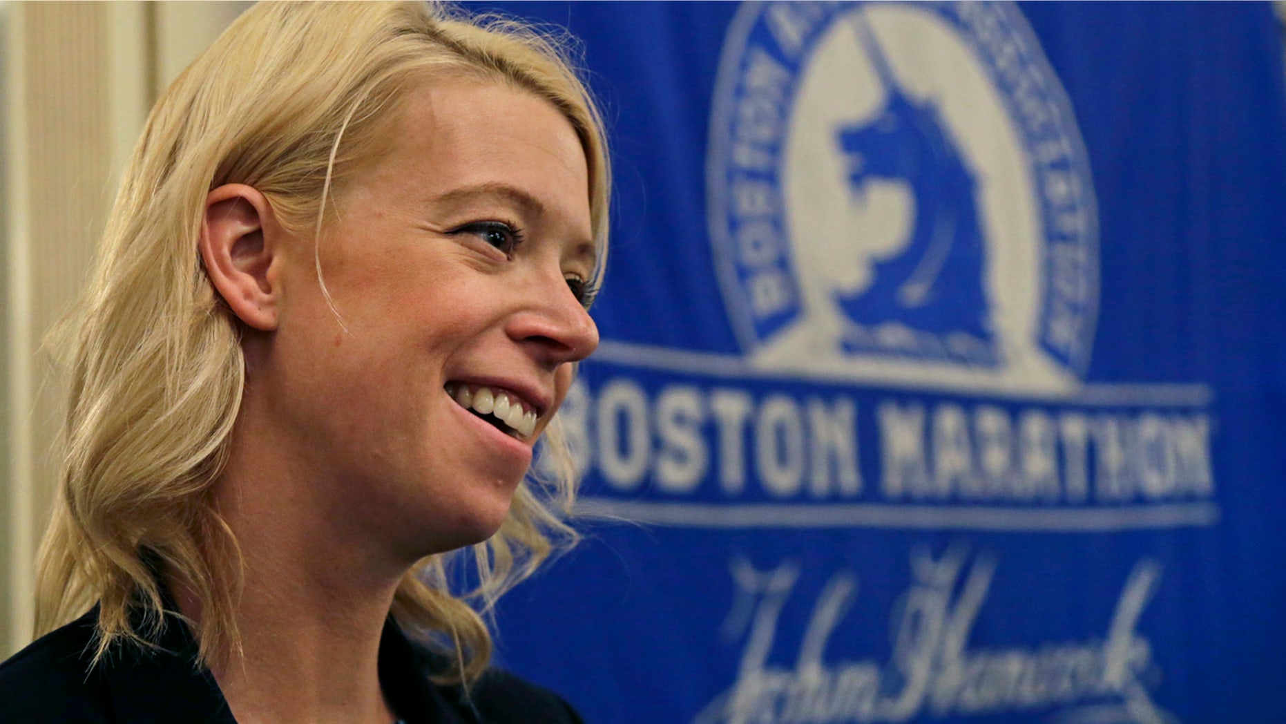 April 14, 2016: Adrianne Haslet, a 2013 Boston Marathon survivor, speaks at a news conference in Boston after receiving the Patriots' Award, which is annually given to a New England-based individual, group, or organization that is patriotic, philanthropic, and inspirational, and fosters goodwill and sportsmanship.