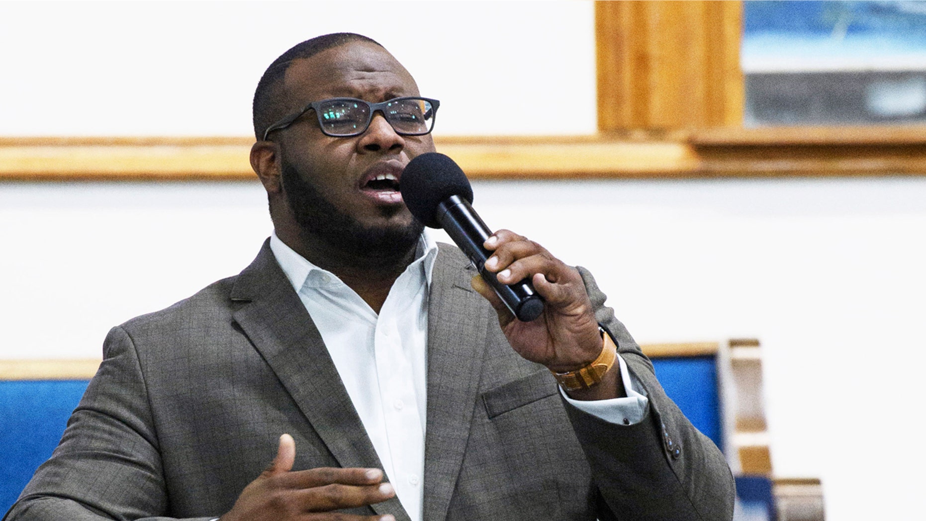 This Sept. 21, 2017, photo provided by Harding University in Search, Ark., shows Botham Jean leading worship at a university presidential reception in Dallas.