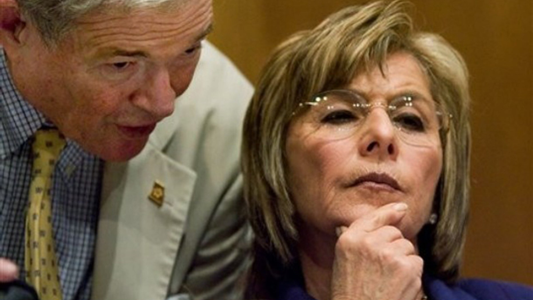Sen. Barbara Boxer is shown here, alongside Sen. Kit Bond, at a committee hearing on Capitol Hill July 21. (AP Photo)