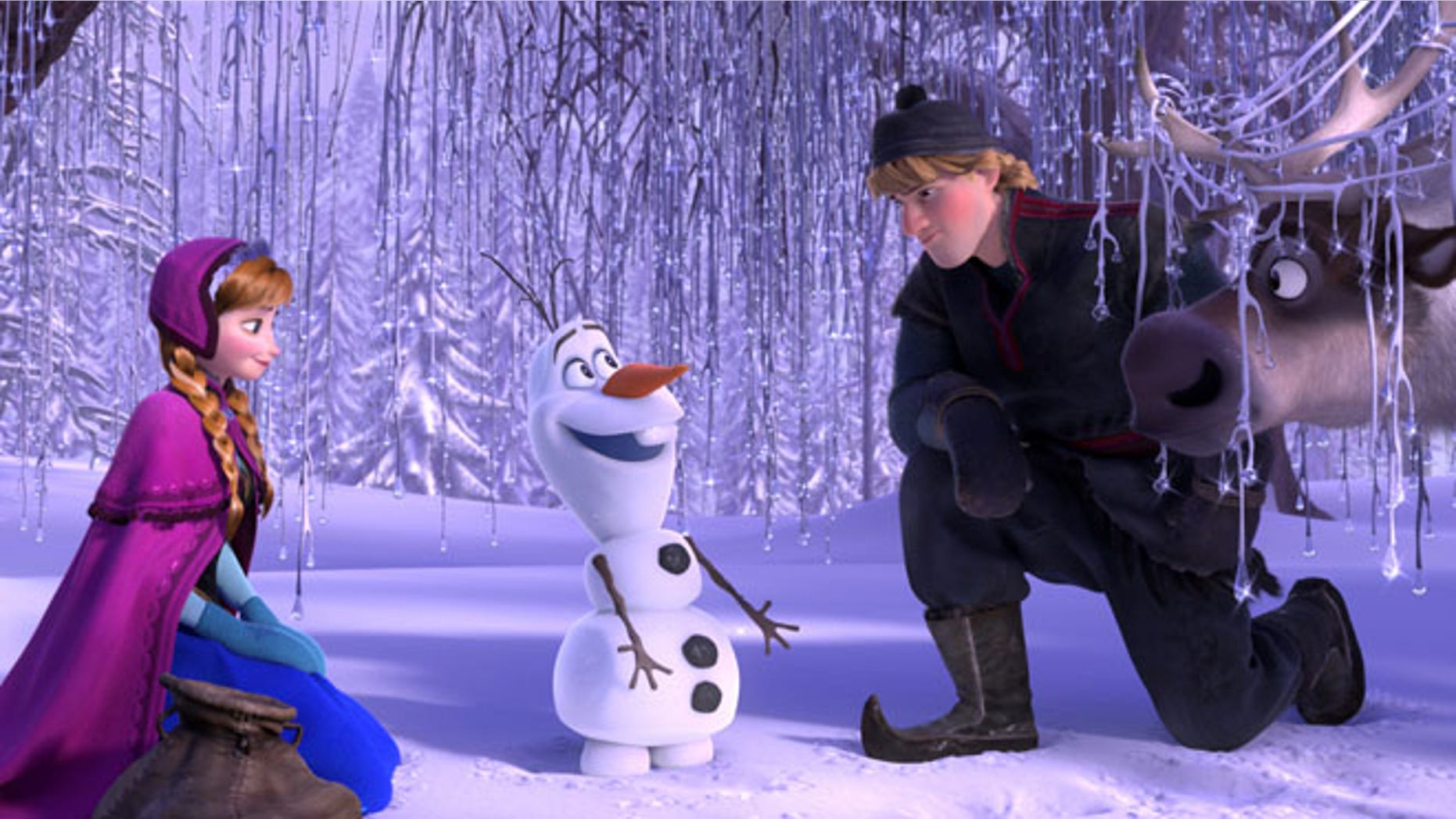 This image released by Disney shows, from left, Anna, voiced by Kristen Bell, Olaf, voiced by Josh Gad, and Kristoff, voiced by Jonathan Groff in a scene from the animated feature "Frozen." (AP Photo/Disney