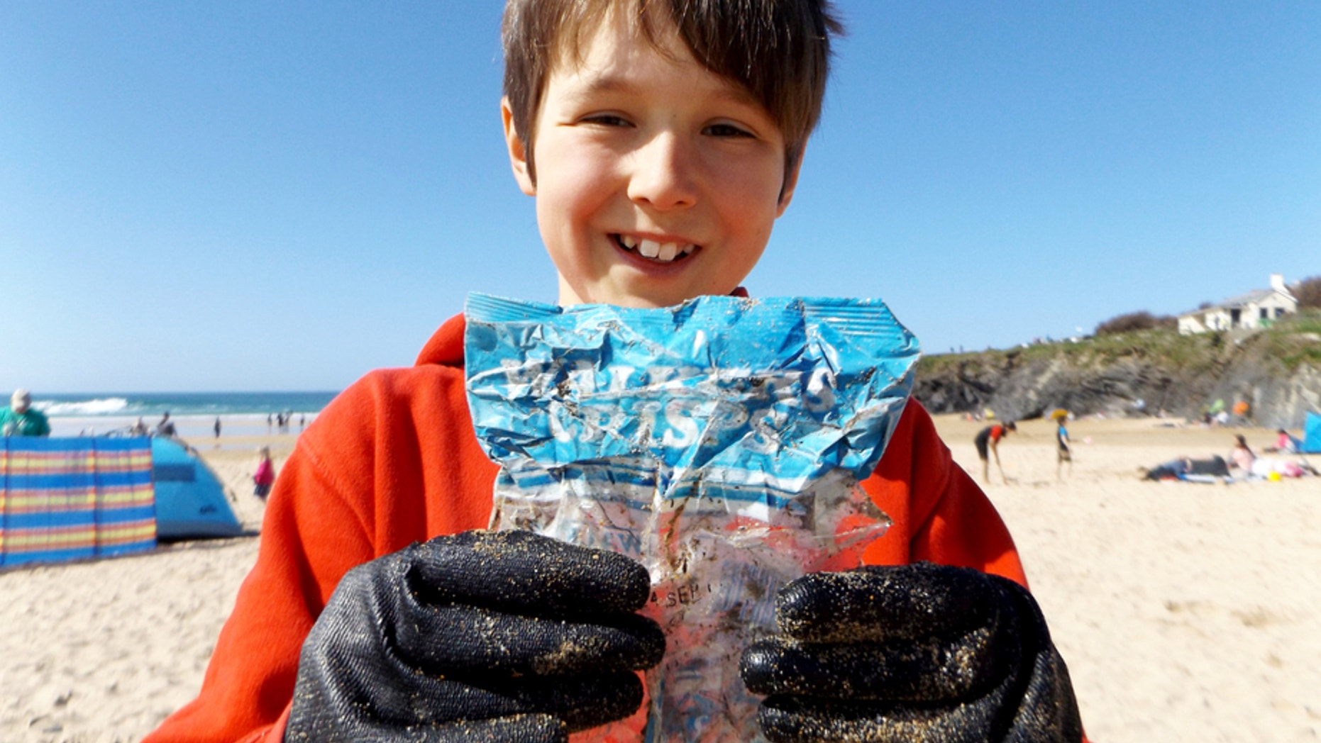 A 10-year-old boy who was cleaning up the beach was left shocked when he discovered a bag of chips from the 1980's.
