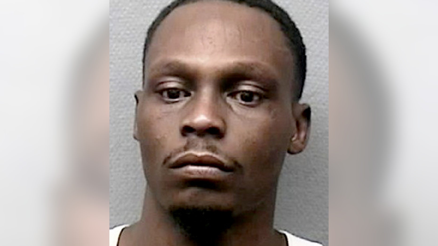 Che Lajuan Calhoun is shown in this undated photo provided by the Houston Police Department. Calhoun was arrested Wednesday in the fatal stabbing of 11-year-old Josue Flores, who was attacked as he walked home from school Tuesday.