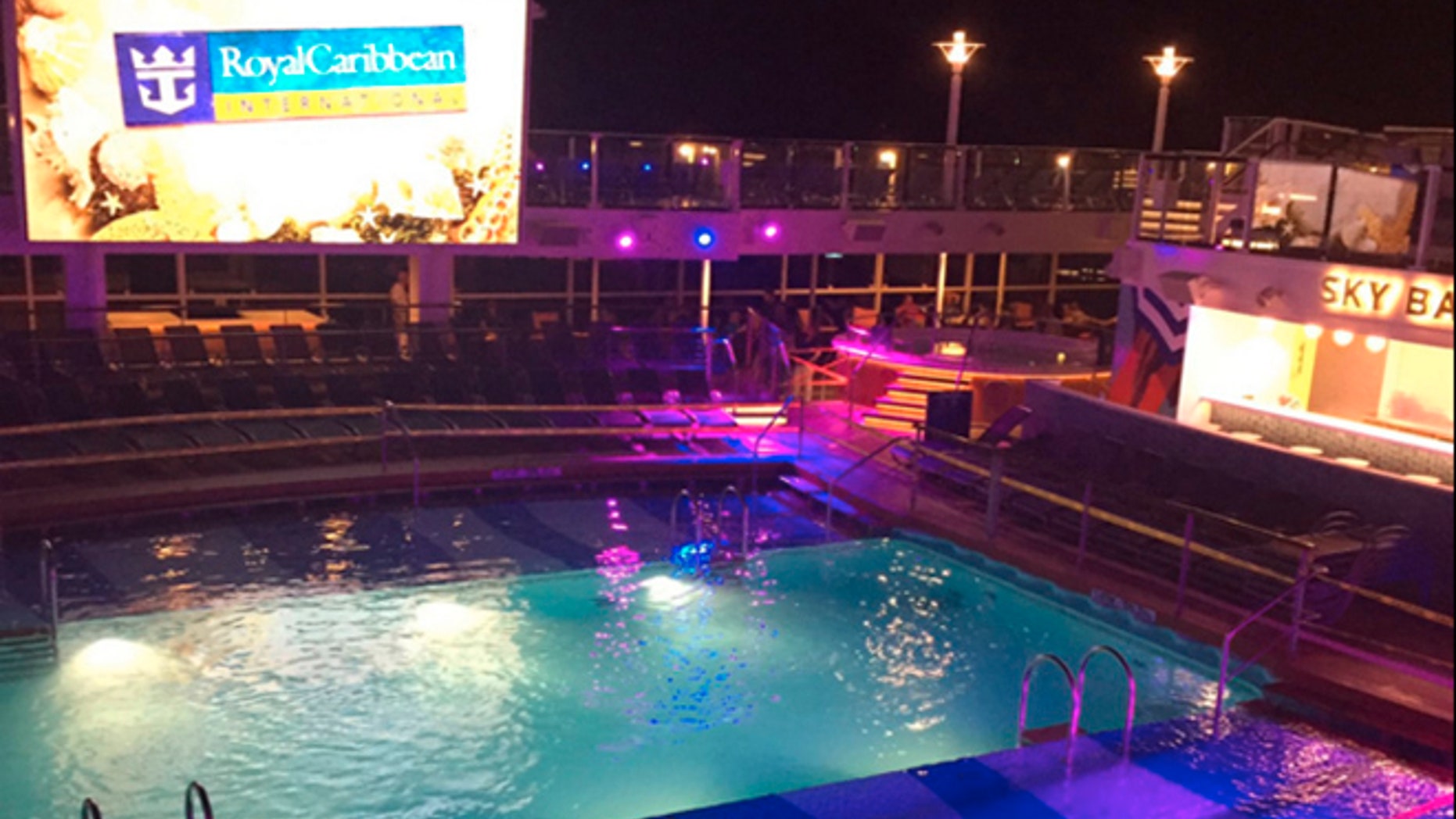 This Thursday, June 30, 2016, photo shows a pool on a Royal Caribbean cruise ship which a child fell into. The U.S. Coast Guard said the boy who fell into the pool on the cruise ship off the coast of New Jersey and nearly drowned is in critical condition. (Jacob Triplett via AP)