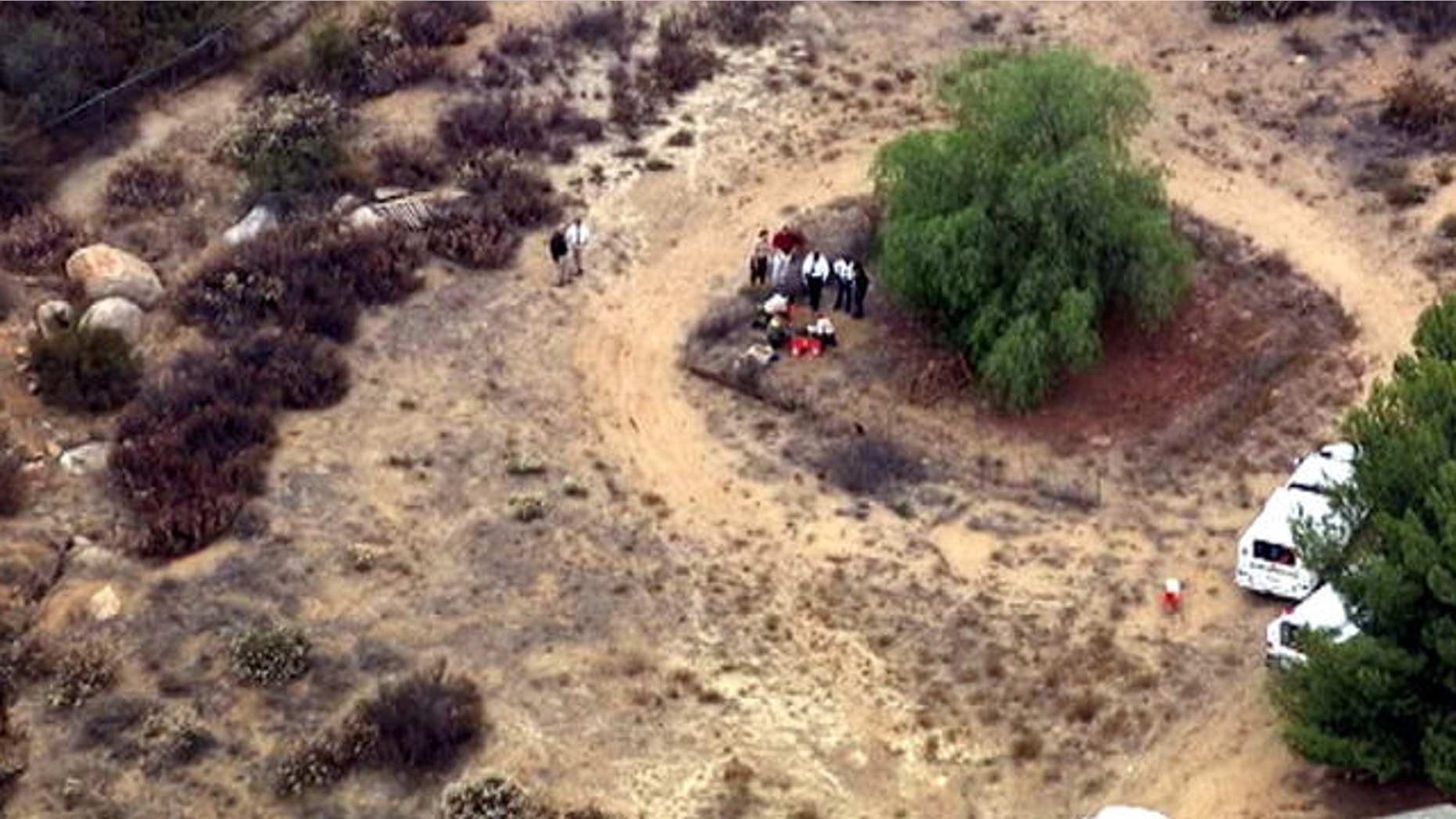 July 10, 2013: This video frame grab released courtesy of NBCLA.com shows an aerial view of investigators digging behind a Menifee, Calif., property in the search for 11-year-old Terry Smith.