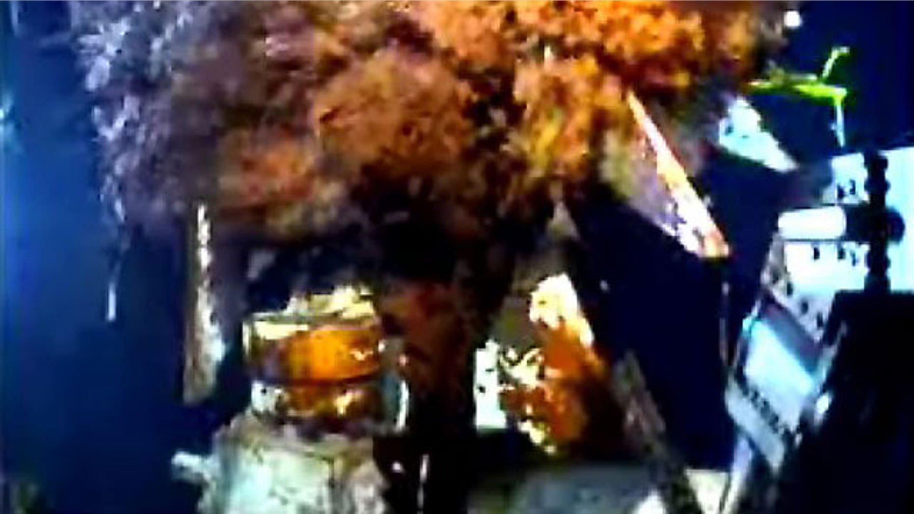 June 23, 2010: This image from video provided by BP shows oil gushing from the broken wellhead at the site of the Deepwater Horizon oil well in the Gulf of Mexico.