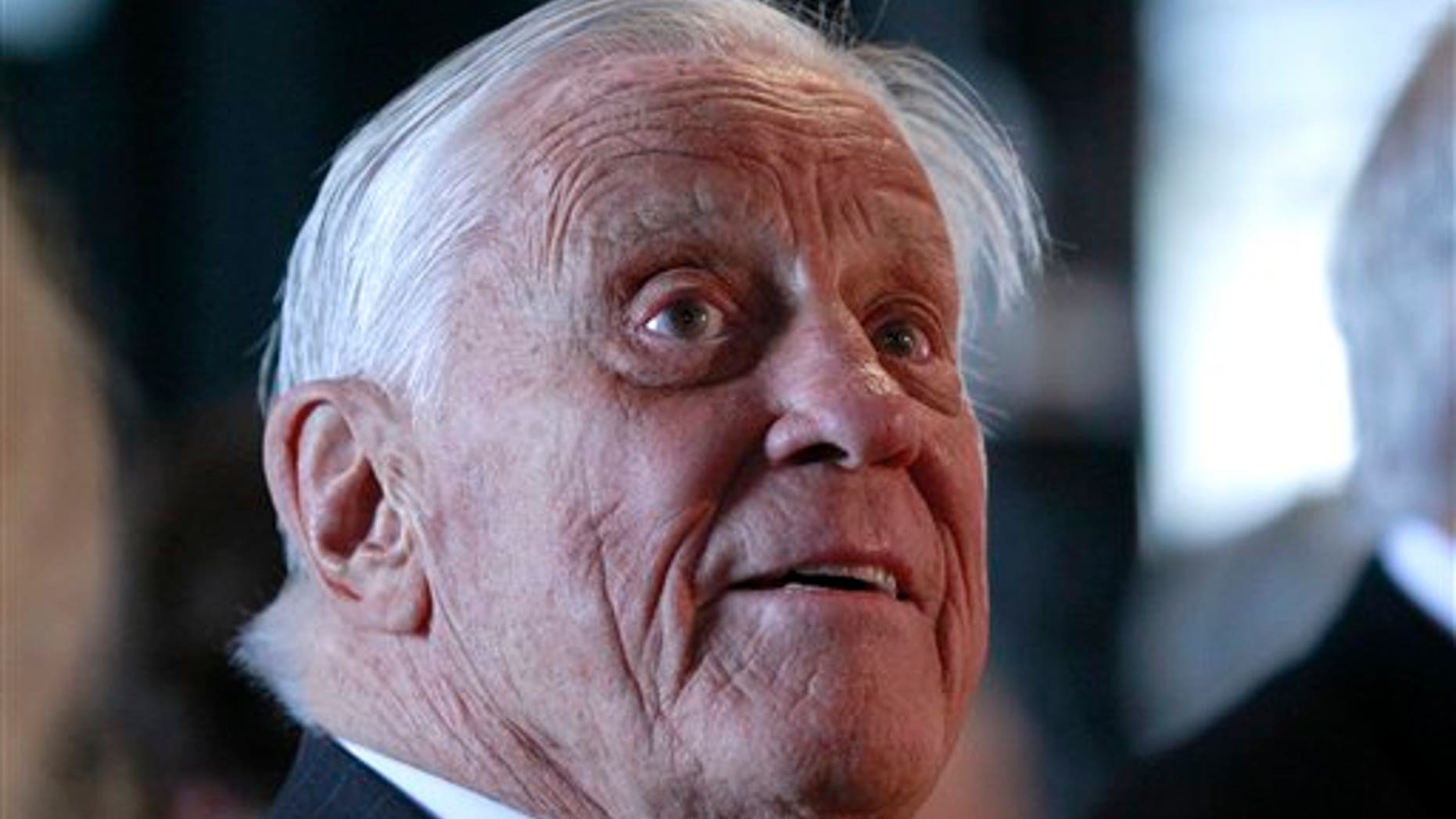 FILE: Ben Bradlee, former executive editor of The Washington Post, listens during an event sponsored by The Washington Post to commemorate the 40th anniversary of Watergate, at the Watergate office building in Washington.