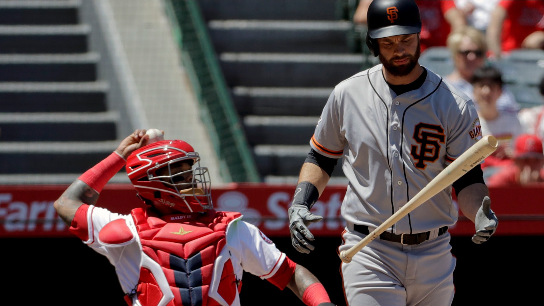 Brandon Belt reacts after hitting a foul ball during his 21-pitch first-inning at-bat Sunday afternoon.