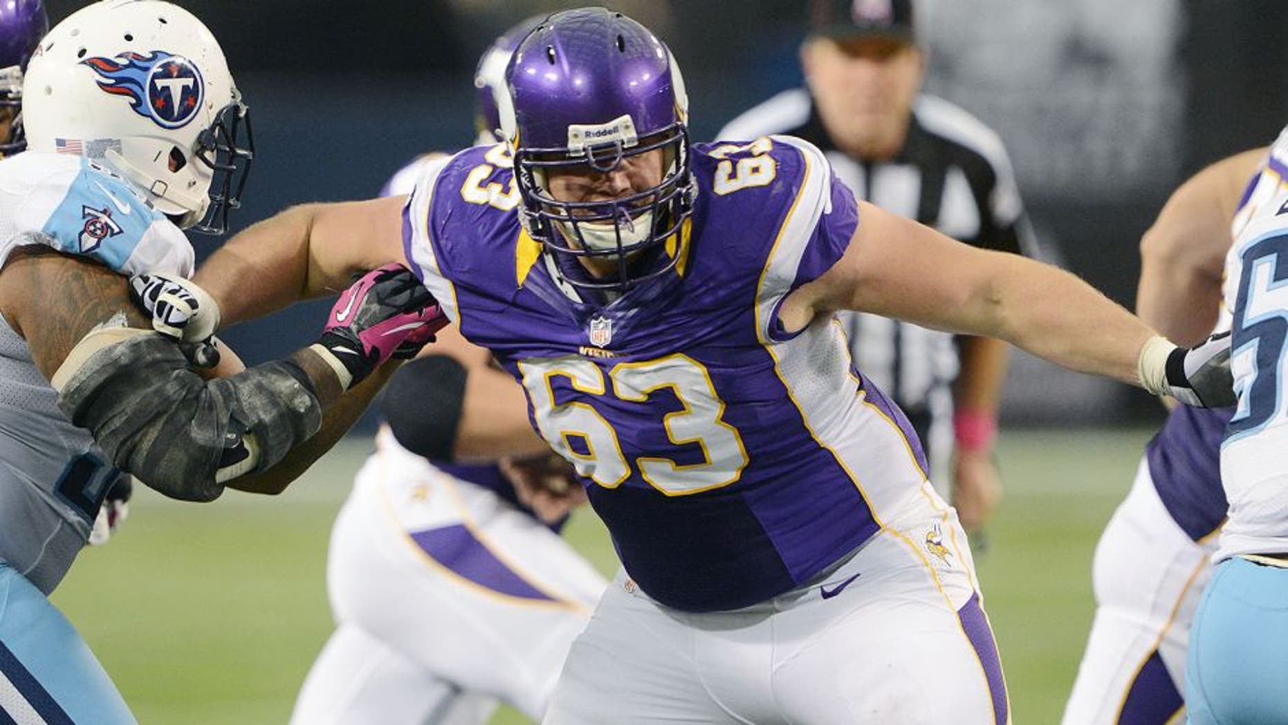 MINNEAPOLIS - OCTOBER 7: Brandon Fusco #63 of the Minnesota Vikings blocks during an NFL game against the Tennessee Titans at Mall of America Field at the Hubert H. Humphrey Metrodome on October 7, 2012 in Minneapolis, Minnesota. (Photo by Tom Dahlin/Getty Images)