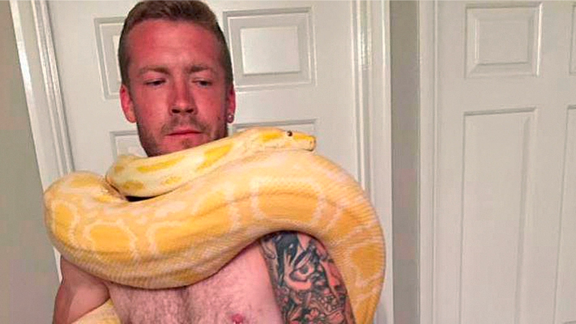 Dan Brandon was found dead on Aug. 25 with his pet python named "Tiny" next to his body.