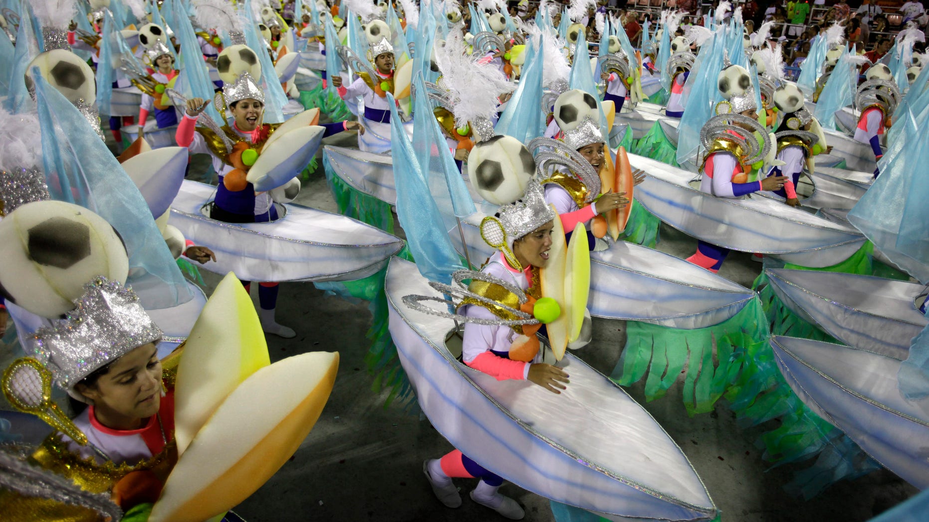 The Renascer de Jacarepagua samba school parades during carnival celebrations at the Sambadrome in Rio de Janeiro, Brazil, Sunday, Feb. 19, 2012. (AP Photo/Victor R. Caivano)