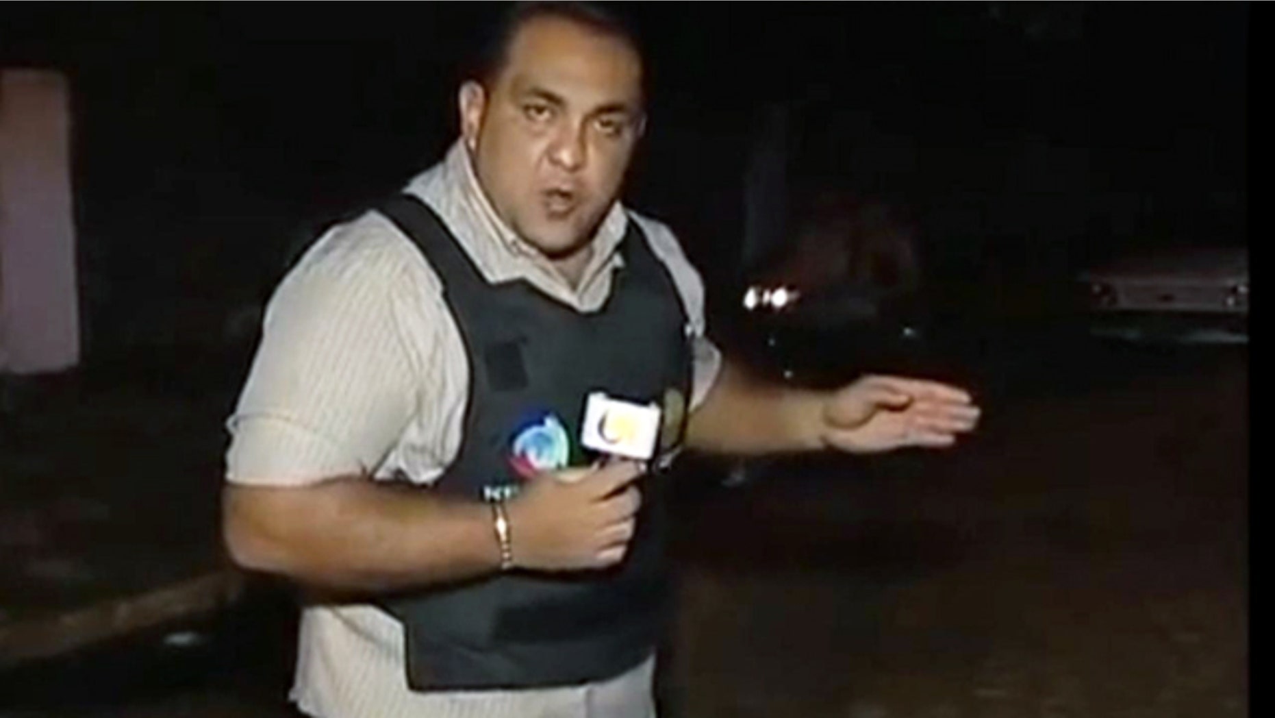 This screenshot from a video posted on YouTube purports to show TV reporter Josenlindo Gonclaves before his TV crew filmed a live shooting.
