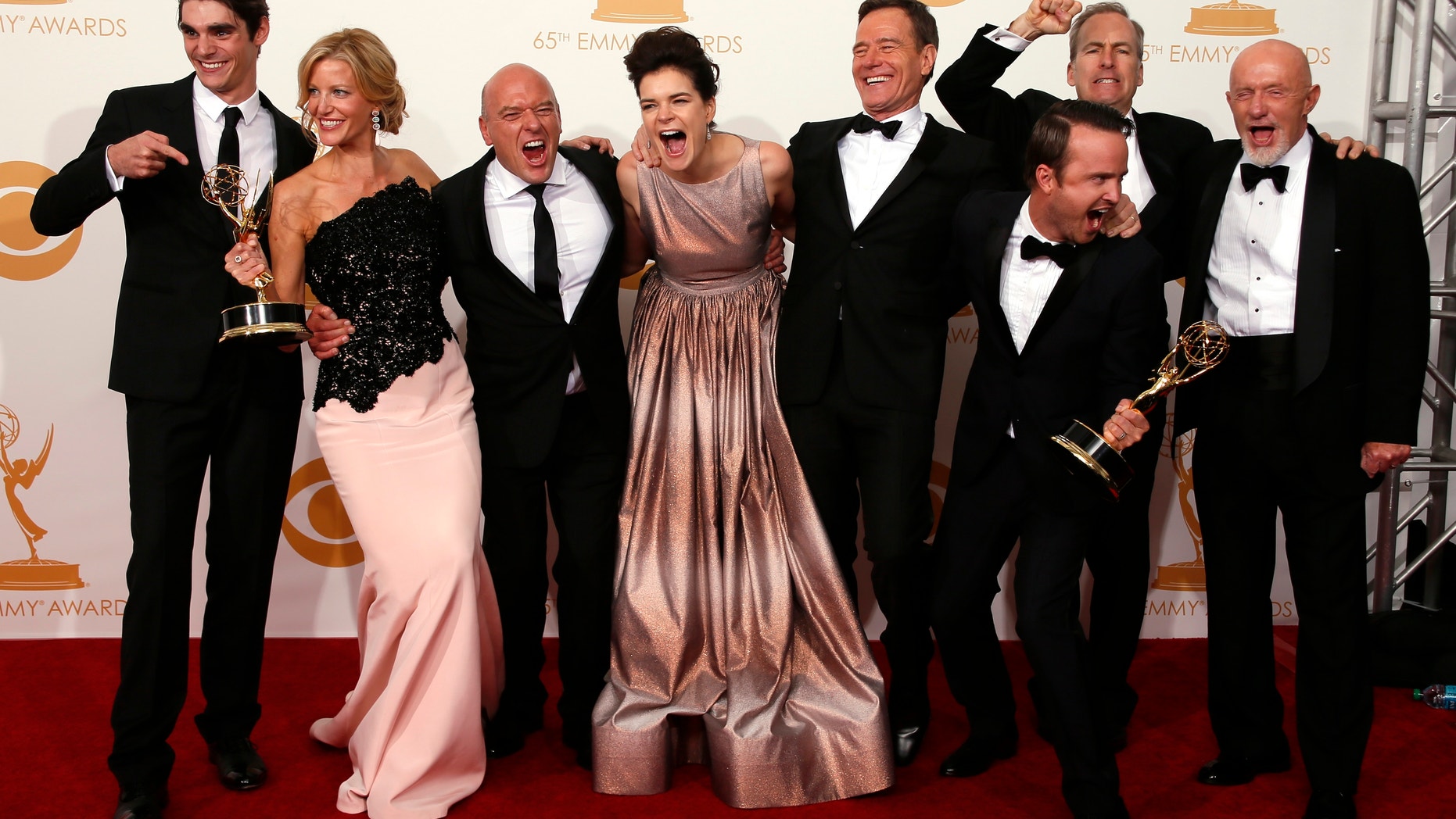 The cast from AMC's series "Breaking Bad" poses backstage with their awards for Outstanding Drama Series
at the 65th Primetime Emmy Awards in Los Angeles September 22, 2013.