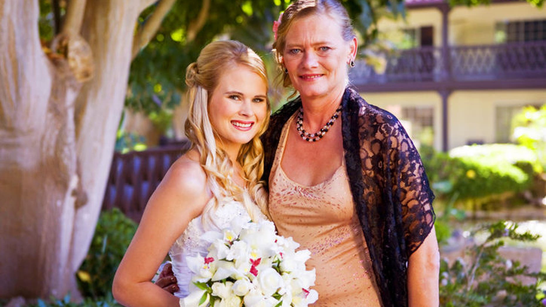 Amanda and her mother on her wedding day (image courtesy subject)