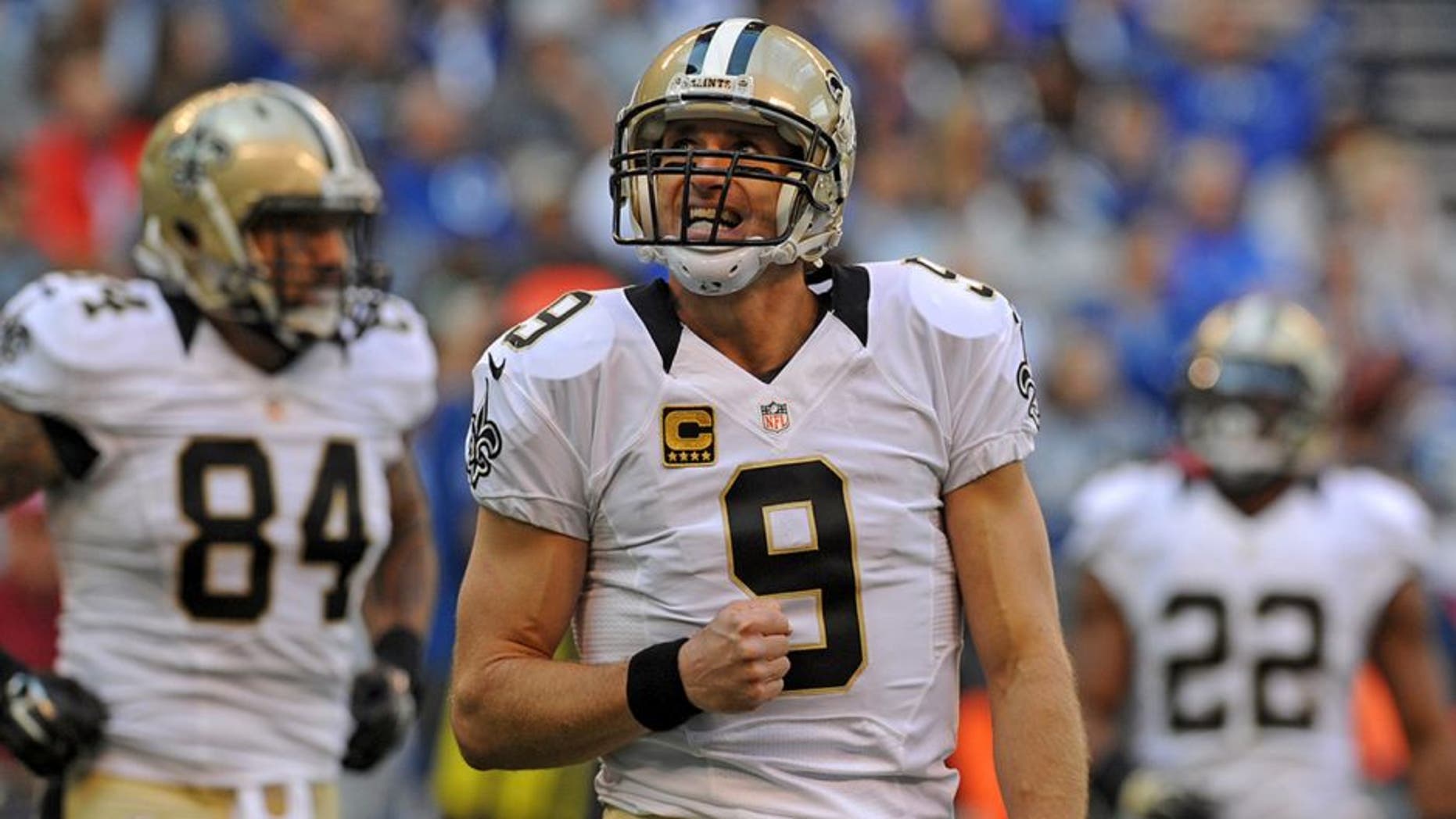 Oct 25, 2015; Indianapolis, IN, USA; New Orleans Saints quarterback Drew Brees (9) reacts after a dropped pass against the Indianapolis Colts in the first quarter at Lucas Oil Stadium. Mandatory Credit: Thomas J. Russo-USA TODAY Sports