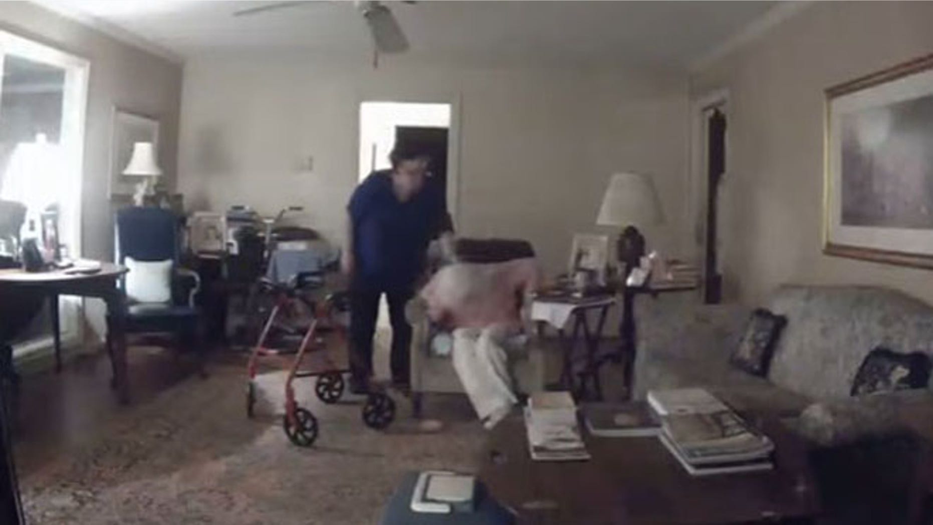 Image from a video that Memorial Villages police say shows caregiver Brenda Floyd striking an elderly woman in her care.