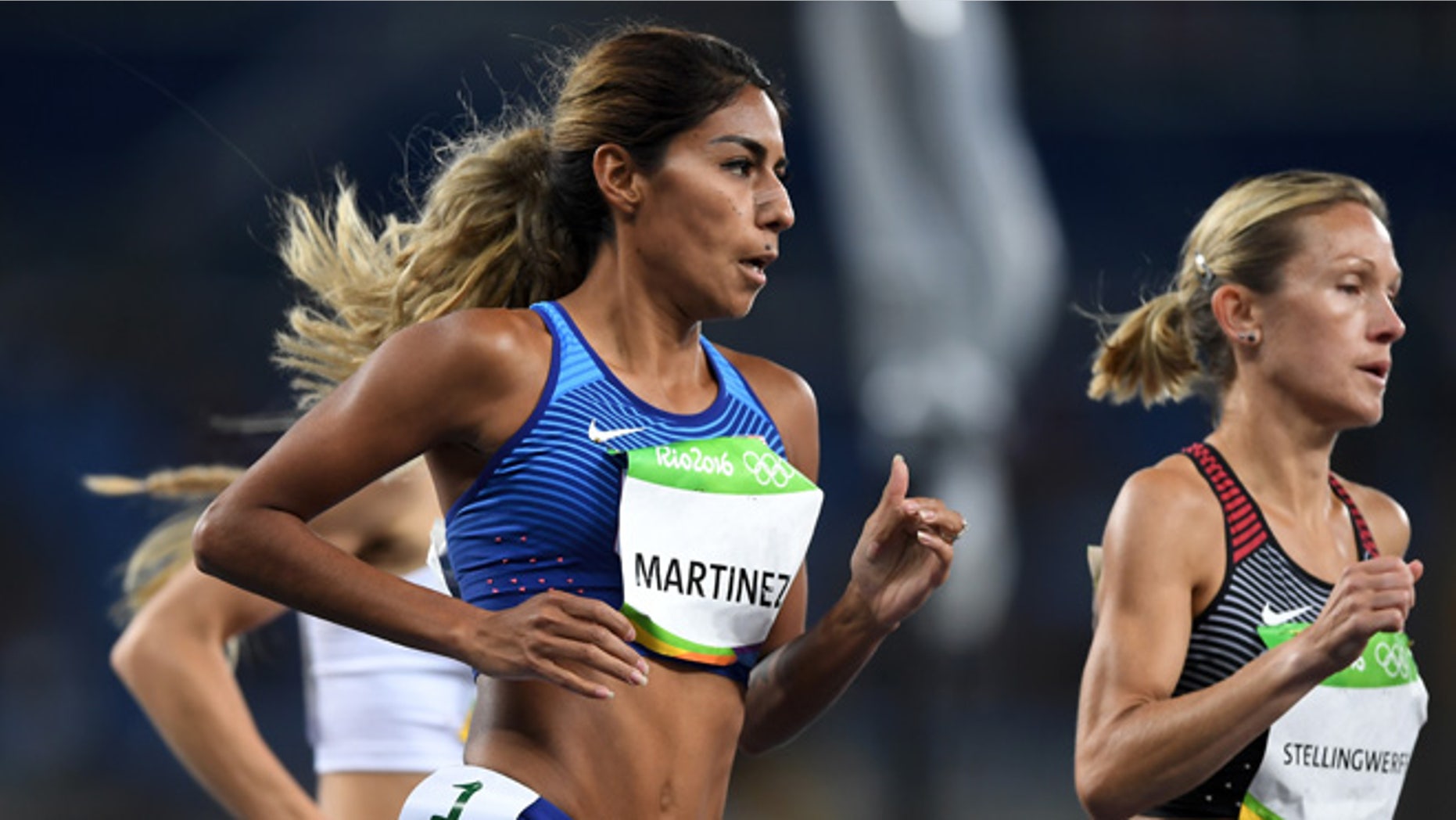 RIO DE JANEIRO, BRAZIL - AUGUST 12: Brenda Martinez of the United States competes in round one of the Women's 1500 metres on Day 7 of the Rio 2016 Olympic Games at the Olympic Stadium on August 12, 2016 in Rio de Janeiro, Brazil. (Photo by Shaun Botterill/Getty Images)