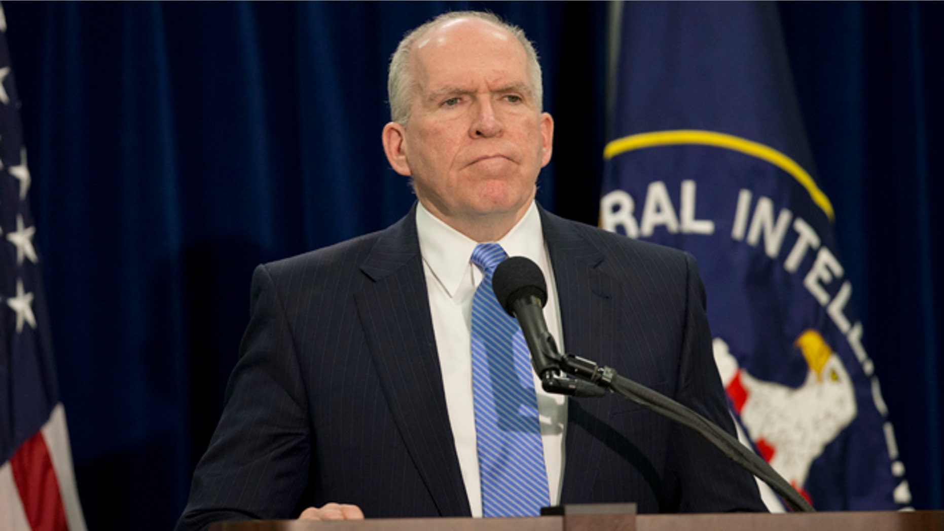 Dec. 11, 2014: CIA Director John Brennan pauses during a news conference at CIA headquarters in Langley, Va.
