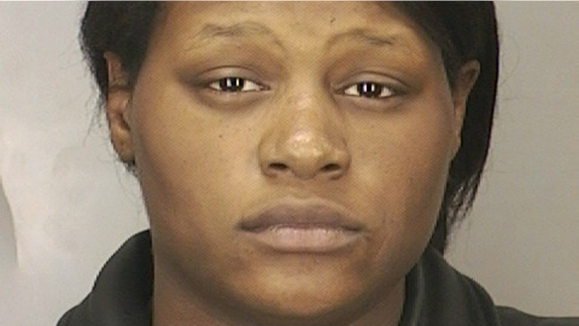 Leatrice Brewer is seen in this 2003 arrest photo provided by the Nassau County Police Department. A judge is holding a hearing Wednesday Nov. 6, 2013 to determine whether a Long Island mother found not guilty because of mental disease in the 2008 drowning of her three children deserves a piece of their $350,000 estate. (AP/Nassau County Police Department)