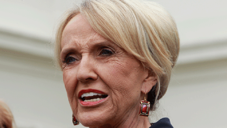 Arizona Gov. Jan Brewer speaks to reporters outside the White House in Washington, Thursday, June 3, 2010, after a private meeting with President Barack Obama. (AP)