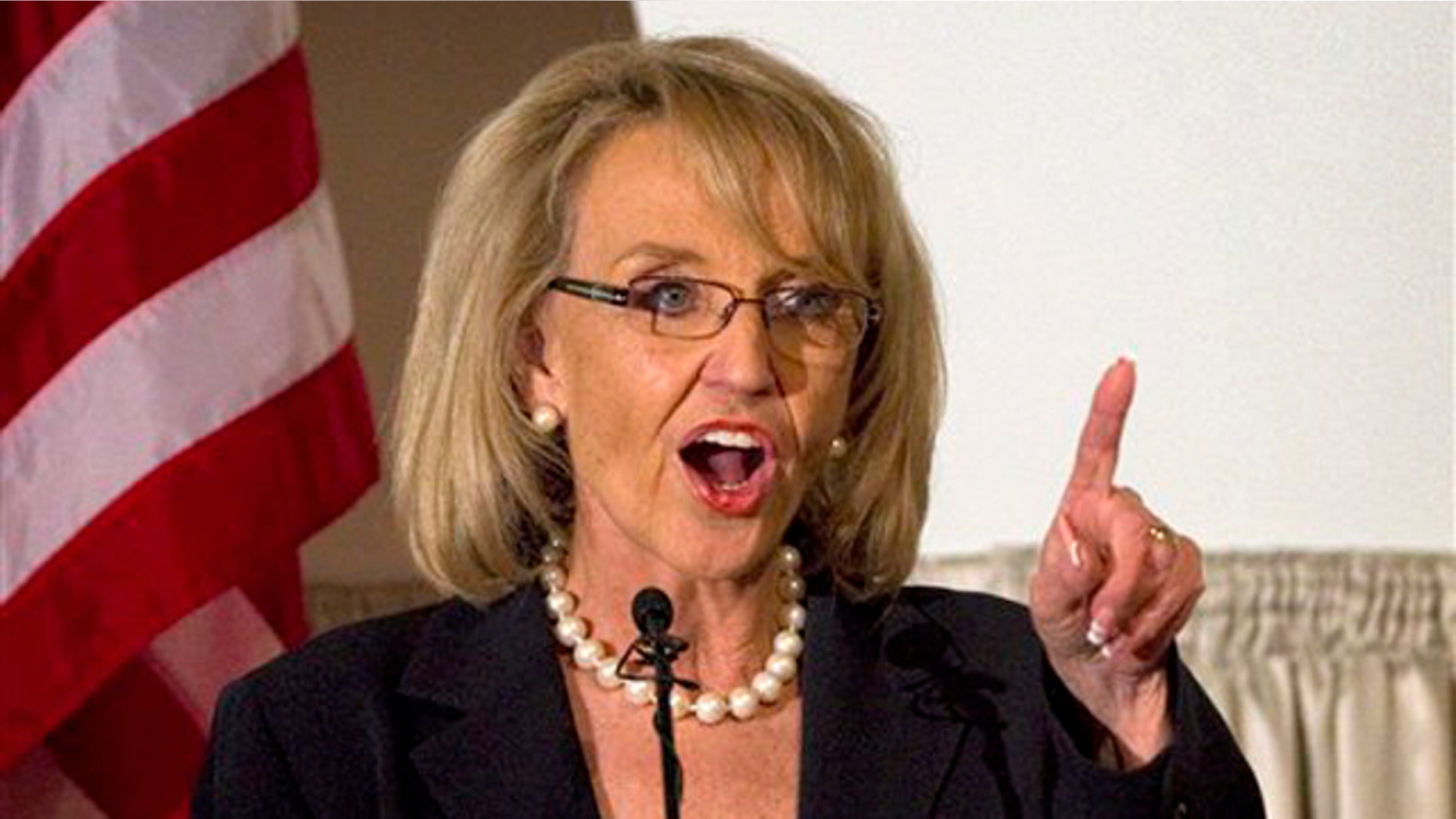 Arizona Gov. Jan Brewer speaks April 19 at the Governor's Volunteer Awards luncheon in Phoenix.
