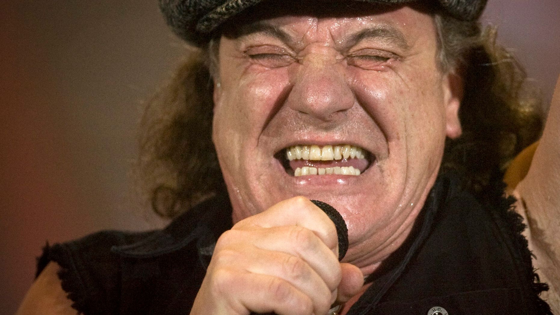 April 6, 2009. Brian Johnson, lead singer of Australian rock band AC/DC, performs during a concert at the Hallestadion in Zurich, Switzerland.
