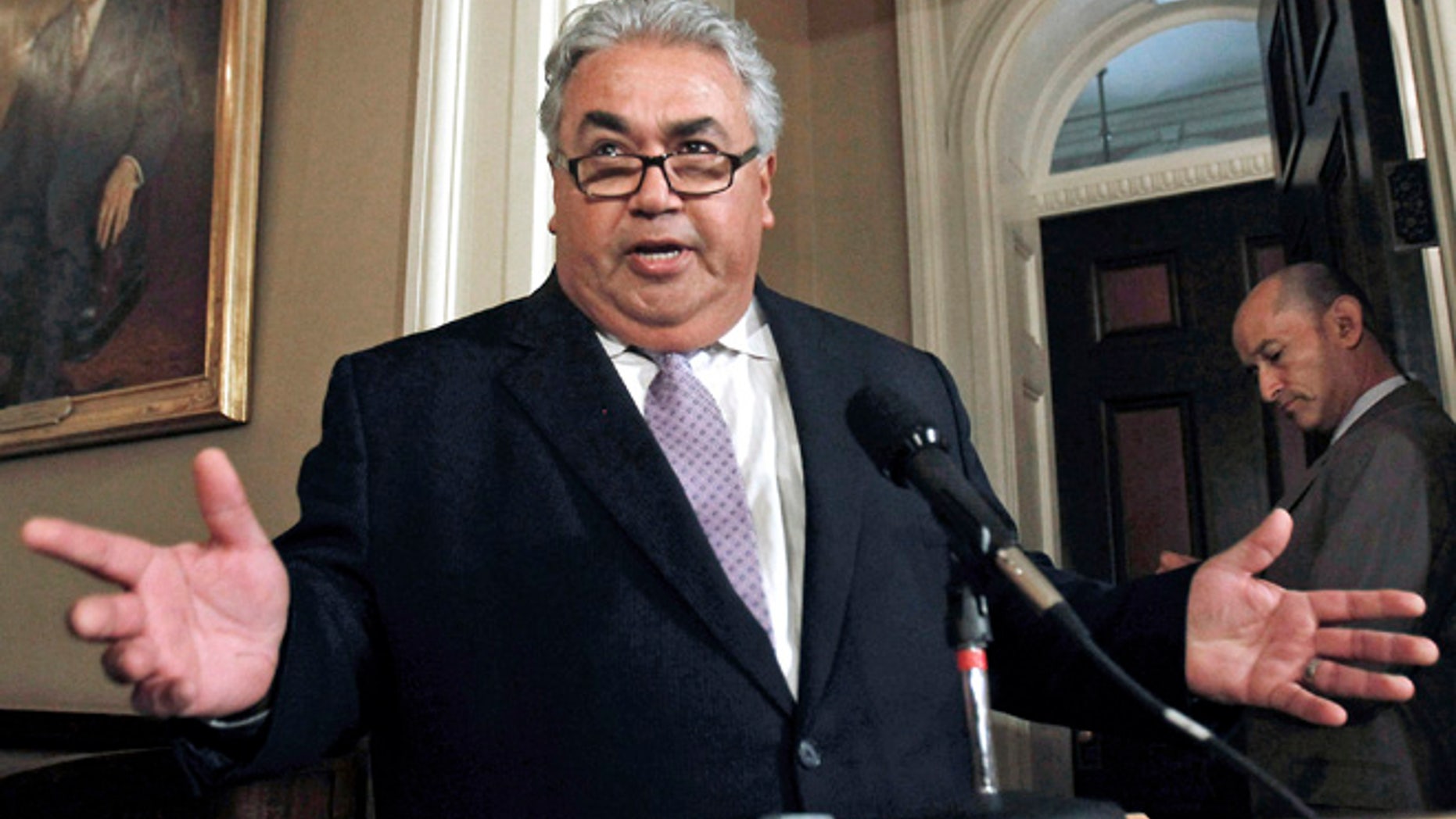 FILE - In this June 10, 2013 file photo, then-California State Sen. Ron Calderon, D-Montebello, discusses the FBI raid on his Capitol office in Sacramento.