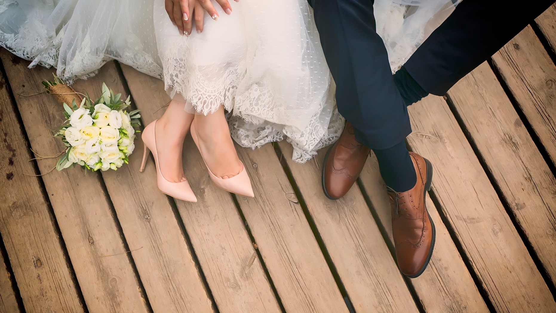 feet of bride and groom, wedding shoes (soft focus). Cross processed image for vintage lookfeet of bride and groom, wedding shoes (soft focus). Cross processed image for vintage look