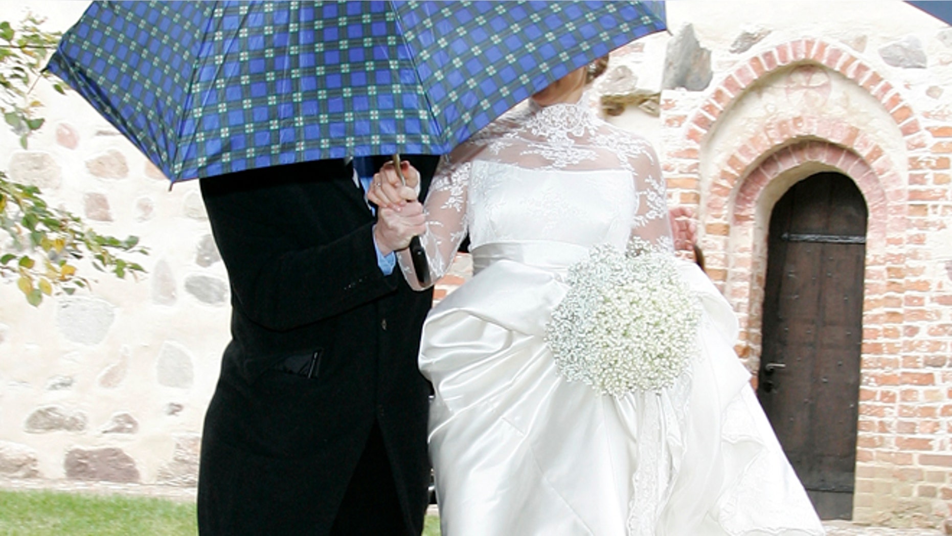 RAMBOW, GERMANY - OCTOBER 03: (EDITORS NOTE: Entertainment Online Subscriptions GLR Included) Barbara Schoeneberger leaves her church wedding with Maximilian von Schierstaedt at the church of Rambow on October 3, 2009 in Rambow, Germany. (Photo by Getty Images)