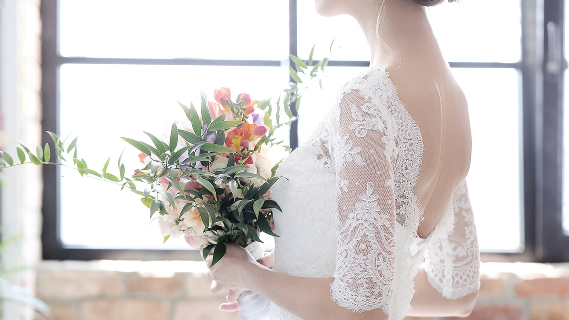 A bride surprised her grandmother by wearing her vintage wedding dress